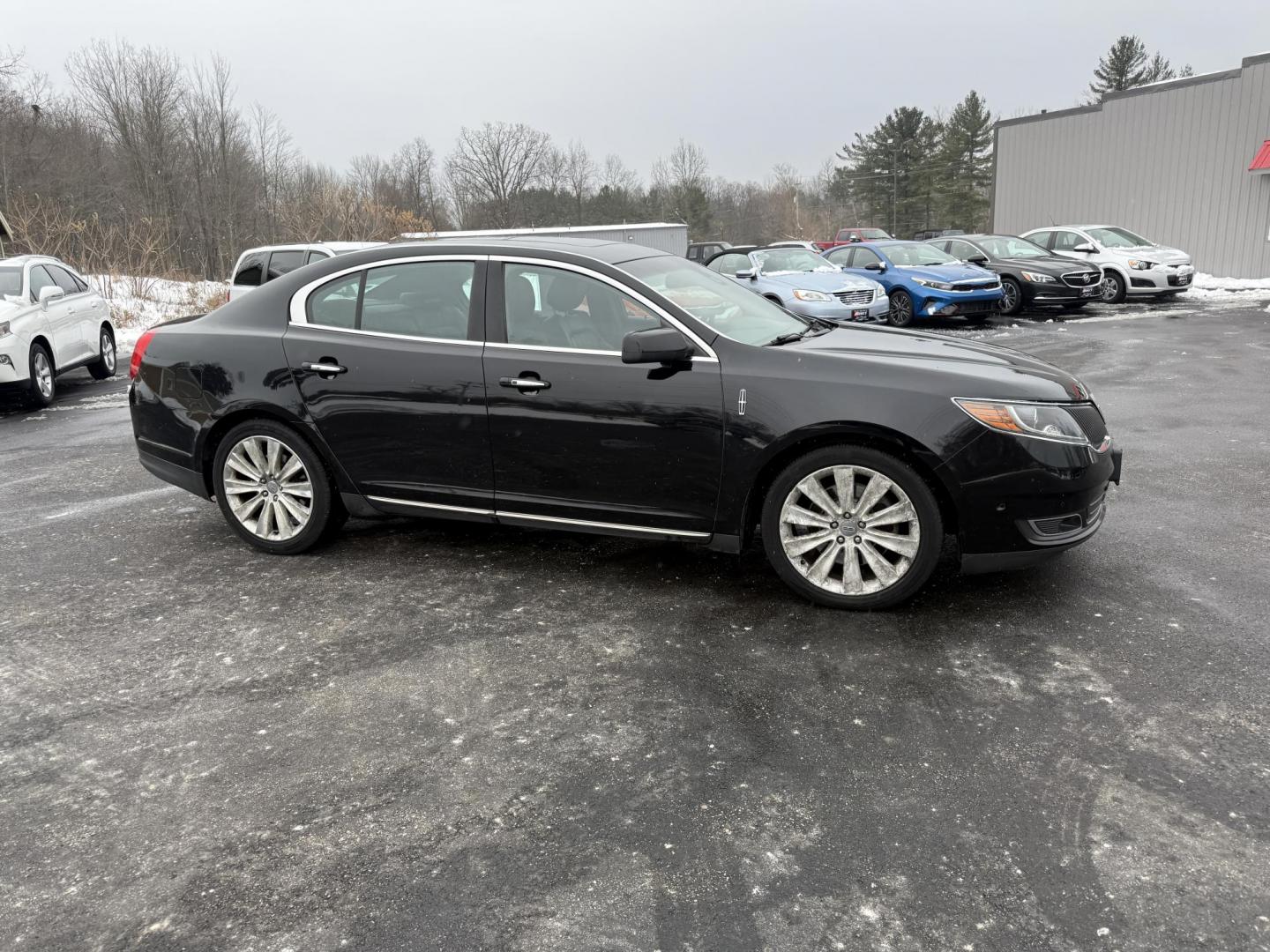 2016 Black /Black Lincoln MKS Elite EcoBoost AWD (1LNHL9FT6GG) with an 3.5L V6 DOHC 24V TWIN TURBO engine, Automatic transmission, located at 11115 Chardon Rd. , Chardon, OH, 44024, (440) 214-9705, 41.580246, -81.241943 - 2016 Lincoln MKS Elite AWD – Luxurious Performance, Cutting-Edge Technology, and Unmatched Comfort Experience the pinnacle of luxury and performance in this 2016 Lincoln MKS Elite AWD. Powered by a potent 3.5L Twin Turbo EcoBoost V6 engine paired with a smooth 6-speed automatic transmission, th - Photo#4