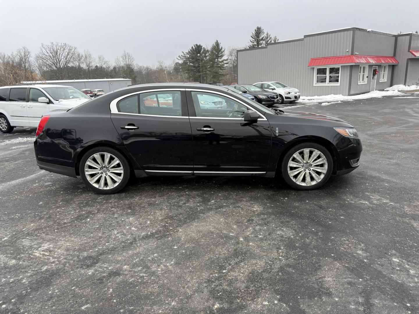 2016 Black /Black Lincoln MKS Elite EcoBoost AWD (1LNHL9FT6GG) with an 3.5L V6 DOHC 24V TWIN TURBO engine, Automatic transmission, located at 11115 Chardon Rd. , Chardon, OH, 44024, (440) 214-9705, 41.580246, -81.241943 - 2016 Lincoln MKS Elite AWD – Luxurious Performance, Cutting-Edge Technology, and Unmatched Comfort Experience the pinnacle of luxury and performance in this 2016 Lincoln MKS Elite AWD. Powered by a potent 3.5L Twin Turbo EcoBoost V6 engine paired with a smooth 6-speed automatic transmission, th - Photo#5