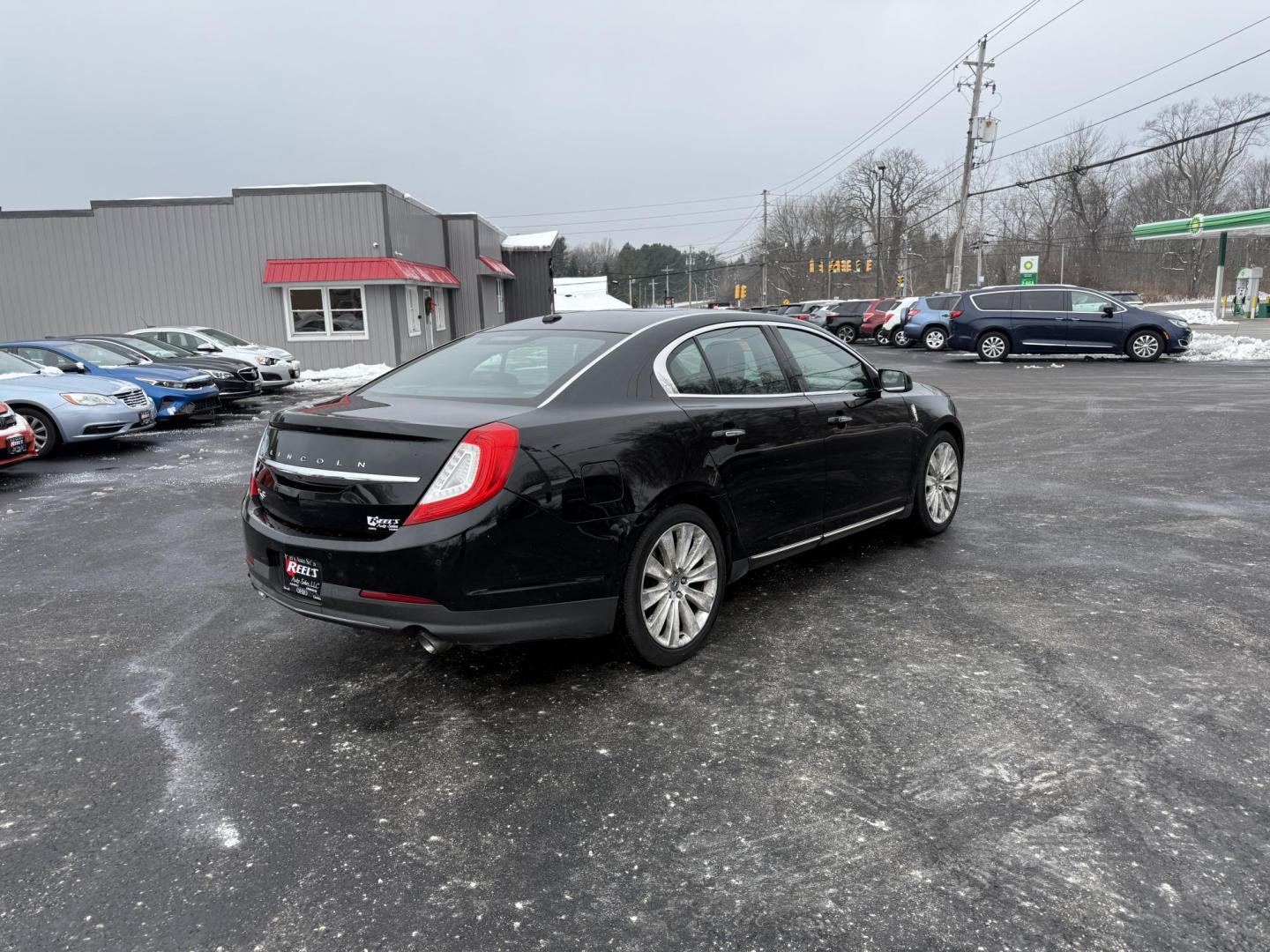 2016 Black /Black Lincoln MKS Elite EcoBoost AWD (1LNHL9FT6GG) with an 3.5L V6 DOHC 24V TWIN TURBO engine, Automatic transmission, located at 11115 Chardon Rd. , Chardon, OH, 44024, (440) 214-9705, 41.580246, -81.241943 - 2016 Lincoln MKS Elite AWD – Luxurious Performance, Cutting-Edge Technology, and Unmatched Comfort Experience the pinnacle of luxury and performance in this 2016 Lincoln MKS Elite AWD. Powered by a potent 3.5L Twin Turbo EcoBoost V6 engine paired with a smooth 6-speed automatic transmission, th - Photo#6
