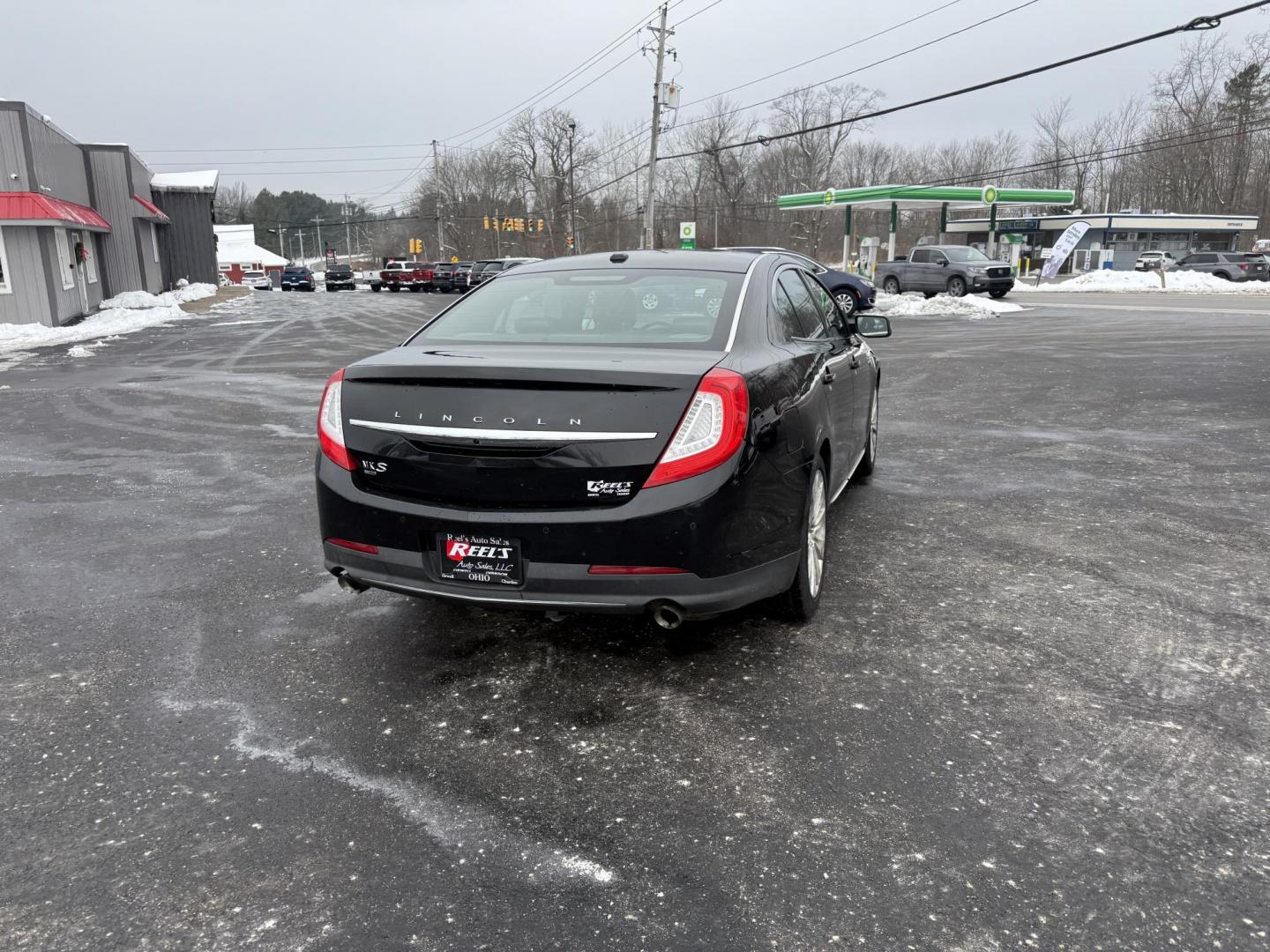2016 Black /Black Lincoln MKS Elite EcoBoost AWD (1LNHL9FT6GG) with an 3.5L V6 DOHC 24V TWIN TURBO engine, Automatic transmission, located at 11115 Chardon Rd. , Chardon, OH, 44024, (440) 214-9705, 41.580246, -81.241943 - 2016 Lincoln MKS Elite AWD – Luxurious Performance, Cutting-Edge Technology, and Unmatched Comfort Experience the pinnacle of luxury and performance in this 2016 Lincoln MKS Elite AWD. Powered by a potent 3.5L Twin Turbo EcoBoost V6 engine paired with a smooth 6-speed automatic transmission, th - Photo#7