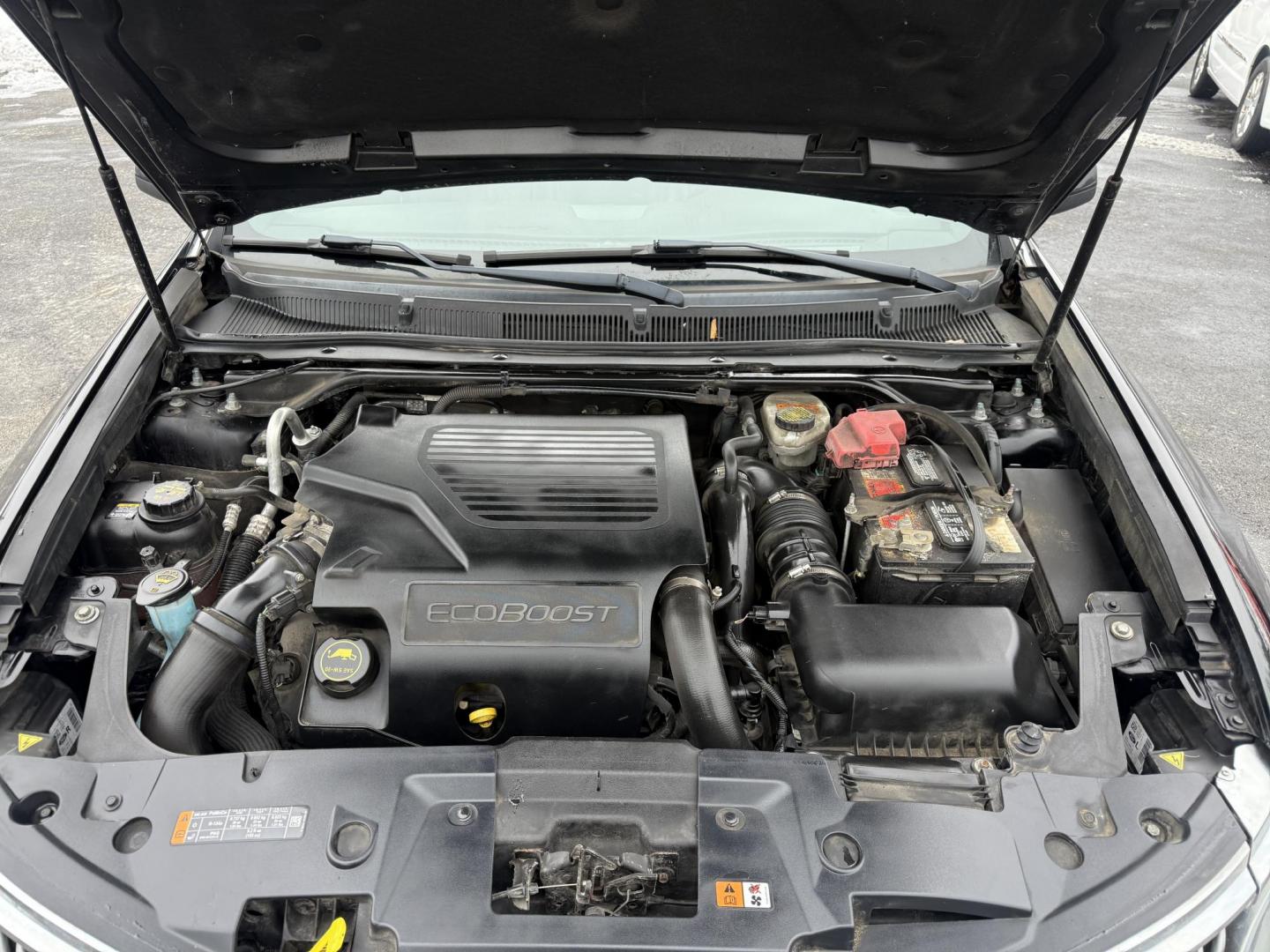 2016 Black /Black Lincoln MKS Elite EcoBoost AWD (1LNHL9FT6GG) with an 3.5L V6 DOHC 24V TWIN TURBO engine, Automatic transmission, located at 11115 Chardon Rd. , Chardon, OH, 44024, (440) 214-9705, 41.580246, -81.241943 - 2016 Lincoln MKS Elite AWD – Luxurious Performance, Cutting-Edge Technology, and Unmatched Comfort Experience the pinnacle of luxury and performance in this 2016 Lincoln MKS Elite AWD. Powered by a potent 3.5L Twin Turbo EcoBoost V6 engine paired with a smooth 6-speed automatic transmission, th - Photo#12