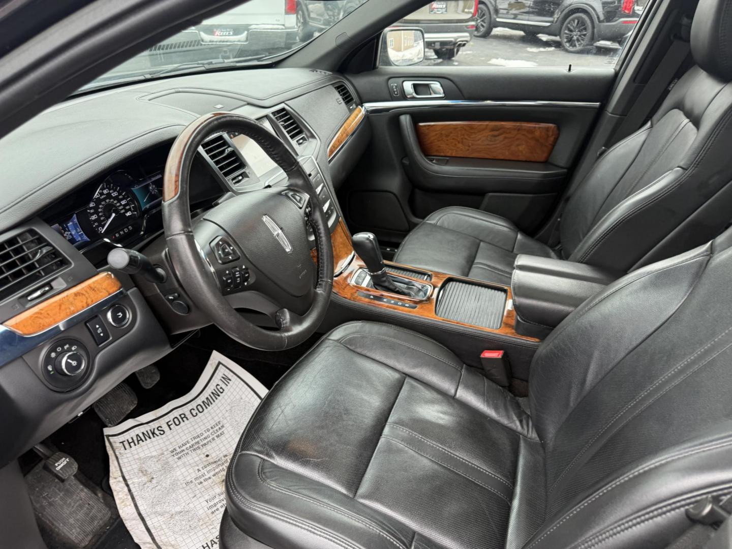 2016 Black /Black Lincoln MKS Elite EcoBoost AWD (1LNHL9FT6GG) with an 3.5L V6 DOHC 24V TWIN TURBO engine, Automatic transmission, located at 11115 Chardon Rd. , Chardon, OH, 44024, (440) 214-9705, 41.580246, -81.241943 - 2016 Lincoln MKS Elite AWD – Luxurious Performance, Cutting-Edge Technology, and Unmatched Comfort Experience the pinnacle of luxury and performance in this 2016 Lincoln MKS Elite AWD. Powered by a potent 3.5L Twin Turbo EcoBoost V6 engine paired with a smooth 6-speed automatic transmission, th - Photo#13