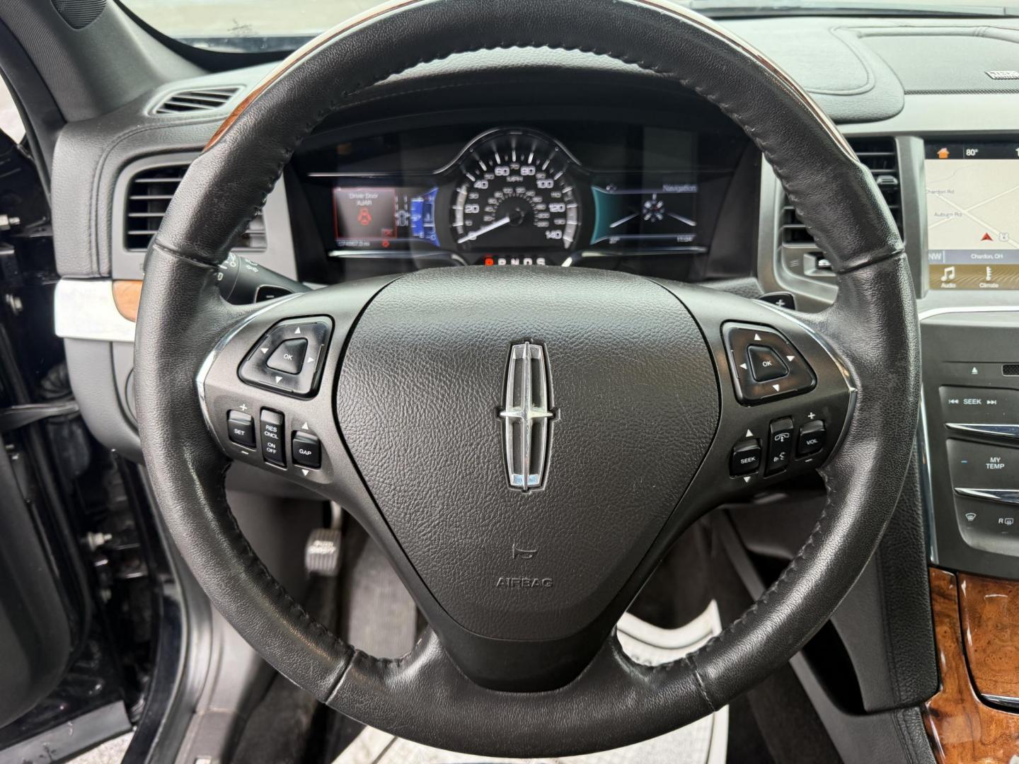 2016 Black /Black Lincoln MKS Elite EcoBoost AWD (1LNHL9FT6GG) with an 3.5L V6 DOHC 24V TWIN TURBO engine, Automatic transmission, located at 11115 Chardon Rd. , Chardon, OH, 44024, (440) 214-9705, 41.580246, -81.241943 - 2016 Lincoln MKS Elite AWD – Luxurious Performance, Cutting-Edge Technology, and Unmatched Comfort Experience the pinnacle of luxury and performance in this 2016 Lincoln MKS Elite AWD. Powered by a potent 3.5L Twin Turbo EcoBoost V6 engine paired with a smooth 6-speed automatic transmission, th - Photo#24