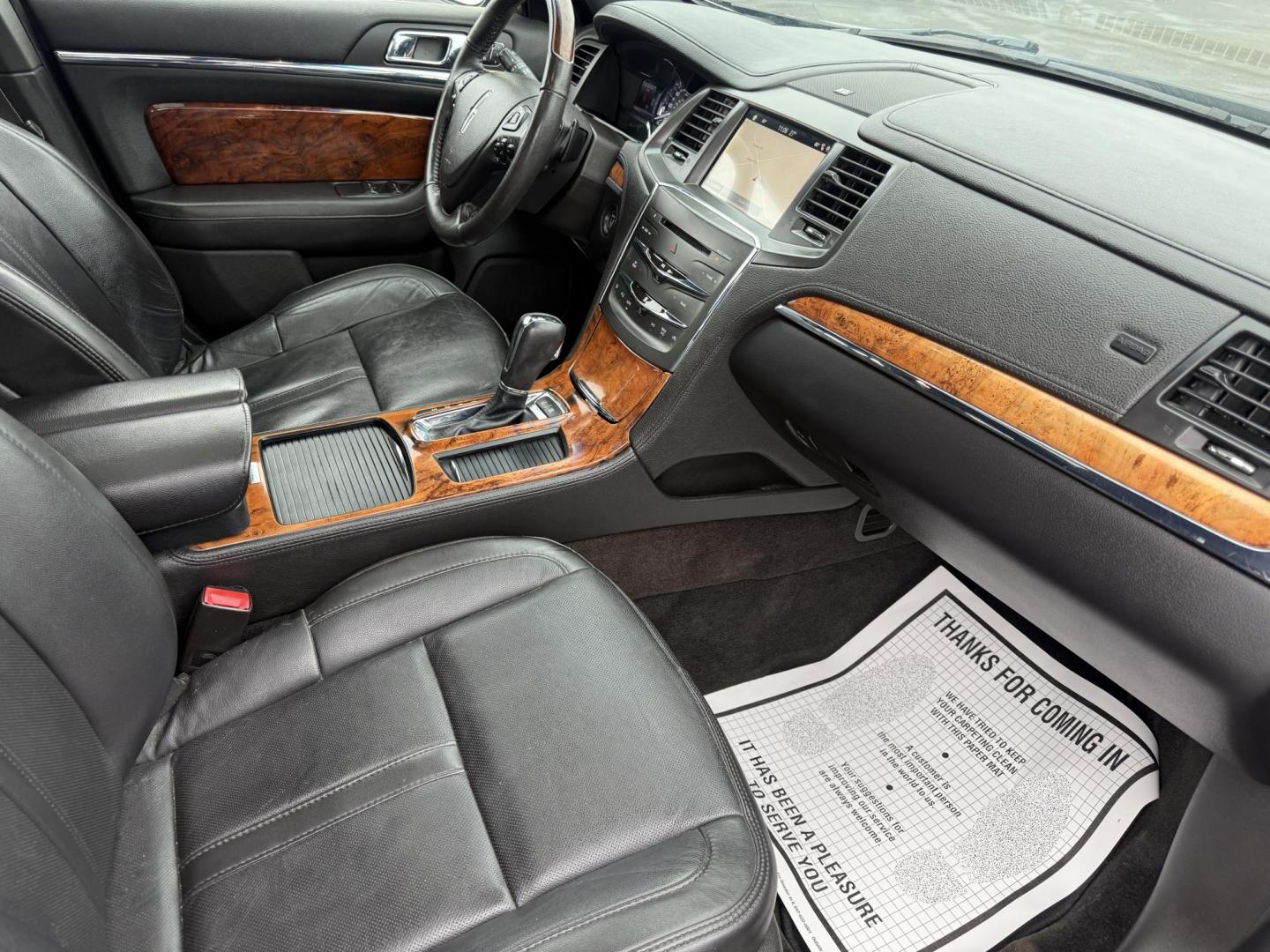 2016 Black /Black Lincoln MKS Elite EcoBoost AWD (1LNHL9FT6GG) with an 3.5L V6 DOHC 24V TWIN TURBO engine, Automatic transmission, located at 11115 Chardon Rd. , Chardon, OH, 44024, (440) 214-9705, 41.580246, -81.241943 - 2016 Lincoln MKS Elite AWD – Luxurious Performance, Cutting-Edge Technology, and Unmatched Comfort Experience the pinnacle of luxury and performance in this 2016 Lincoln MKS Elite AWD. Powered by a potent 3.5L Twin Turbo EcoBoost V6 engine paired with a smooth 6-speed automatic transmission, th - Photo#46