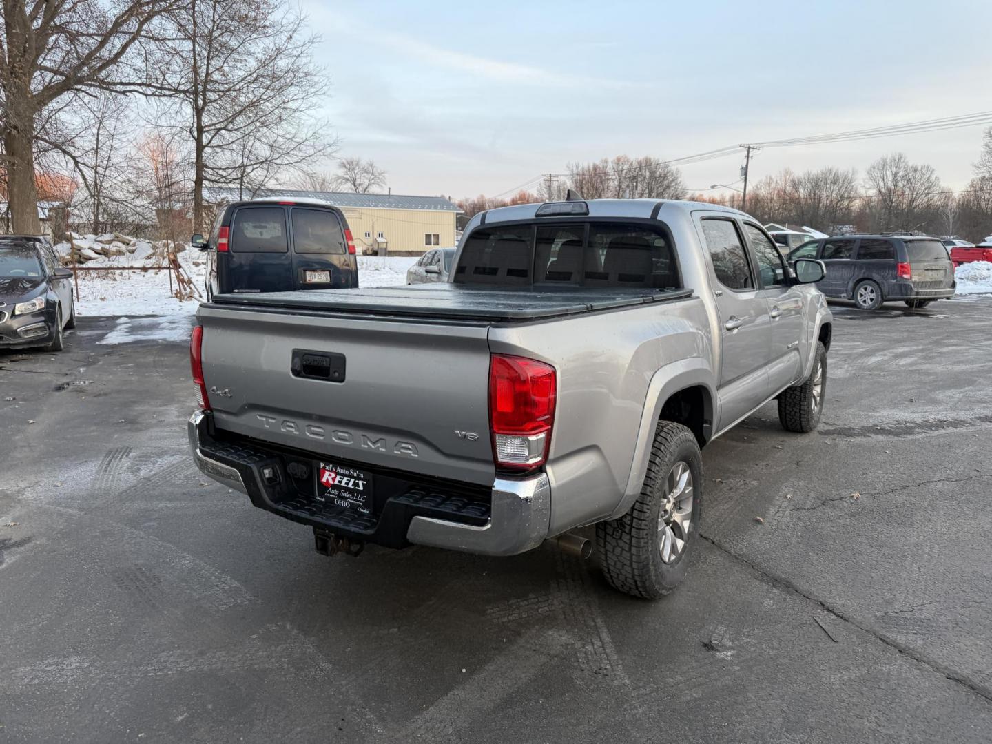 2016 Silver /Black Toyota Tacoma SR5 Double Cab Short Bed V6 5AT 4WD (3TMCZ5AN1GM) with an 3.5L V6 DOHC 24V engine, Automatic transmission, located at 547 E. Main St., Orwell, OH, 44076, (440) 437-5893, 41.535435, -80.847855 - 2016 Toyota Tacoma SR5 Crew Cab 4WD – Rugged Power, Reliability, and Versatile Performance Take on any adventure with confidence in this 2016 Toyota Tacoma SR5 Crew Cab 4WD. Powered by a durable 3.5L D-45 V6 engine and a smooth 6-speed automatic transmission, this truck delivers impressive perf - Photo#7