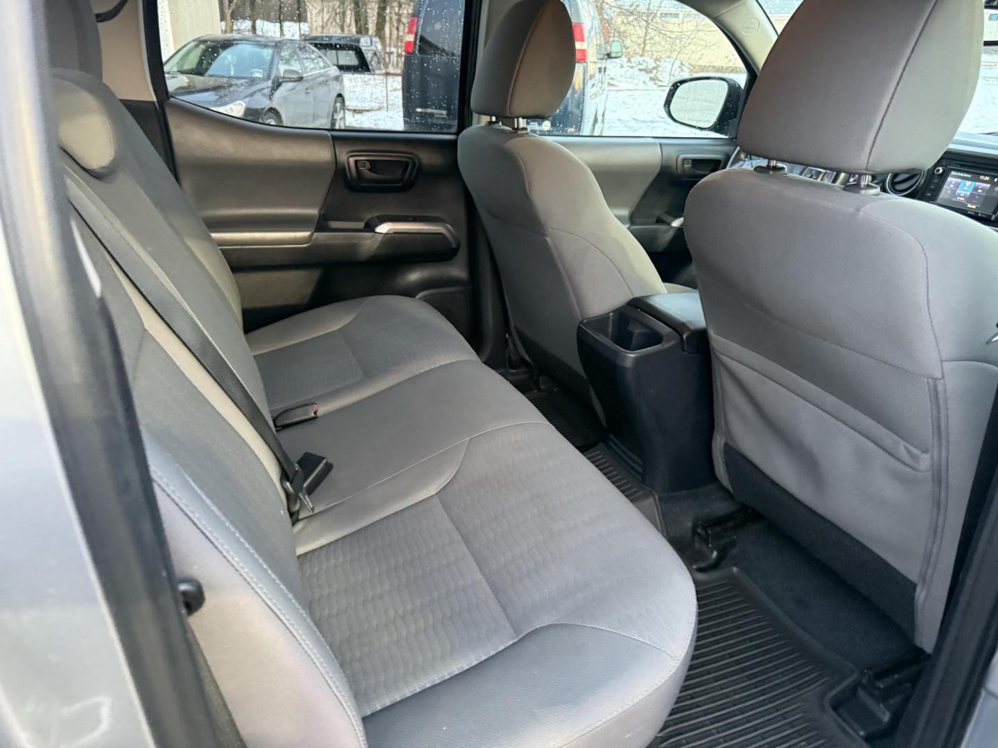 2016 Silver /Black Toyota Tacoma SR5 Double Cab Short Bed V6 5AT 4WD (3TMCZ5AN1GM) with an 3.5L V6 DOHC 24V engine, Automatic transmission, located at 547 E. Main St., Orwell, OH, 44076, (440) 437-5893, 41.535435, -80.847855 - 2016 Toyota Tacoma SR5 Crew Cab 4WD – Rugged Power, Reliability, and Versatile Performance Take on any adventure with confidence in this 2016 Toyota Tacoma SR5 Crew Cab 4WD. Powered by a durable 3.5L D-45 V6 engine and a smooth 6-speed automatic transmission, this truck delivers impressive perf - Photo#34