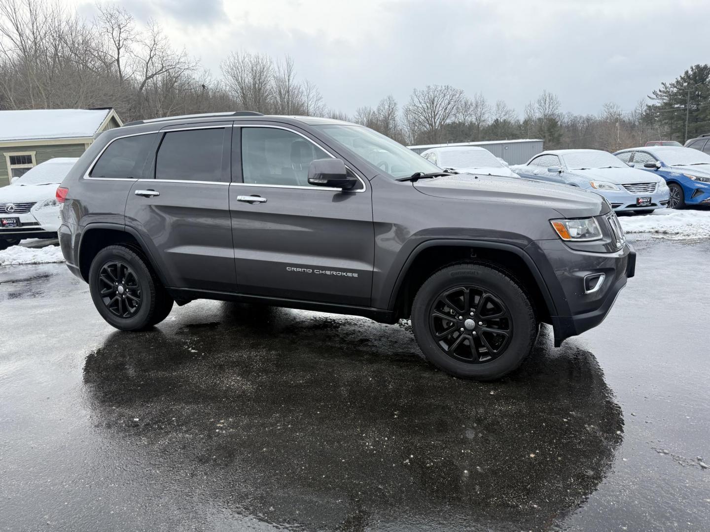 2014 Gray /Black Jeep Grand Cherokee Limited 4WD (1C4RJFBG0EC) with an 3.6L V6 DOHC 24V FFV engine, Automatic transmission, located at 11115 Chardon Rd. , Chardon, OH, 44024, (440) 214-9705, 41.580246, -81.241943 - Photo#3