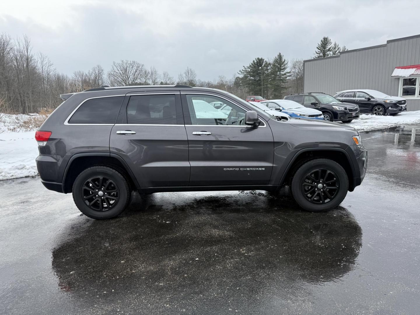 2014 Gray /Black Jeep Grand Cherokee Limited 4WD (1C4RJFBG0EC) with an 3.6L V6 DOHC 24V FFV engine, Automatic transmission, located at 11115 Chardon Rd. , Chardon, OH, 44024, (440) 214-9705, 41.580246, -81.241943 - Photo#5