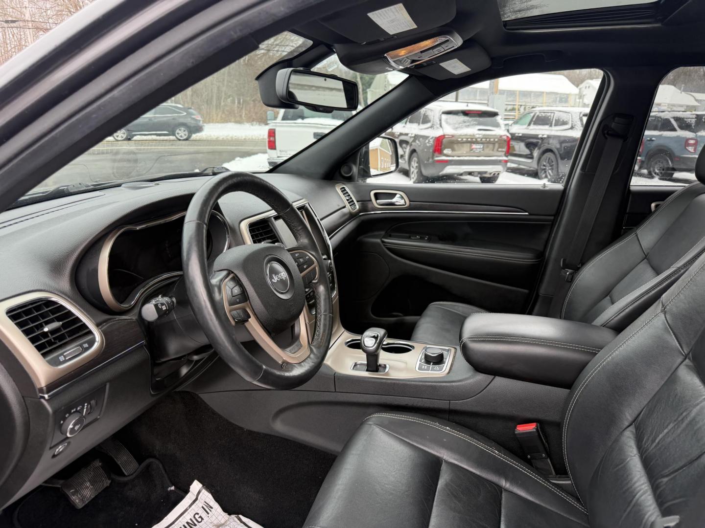 2014 Gray /Black Jeep Grand Cherokee Limited 4WD (1C4RJFBG0EC) with an 3.6L V6 DOHC 24V FFV engine, Automatic transmission, located at 11115 Chardon Rd. , Chardon, OH, 44024, (440) 214-9705, 41.580246, -81.241943 - Photo#15