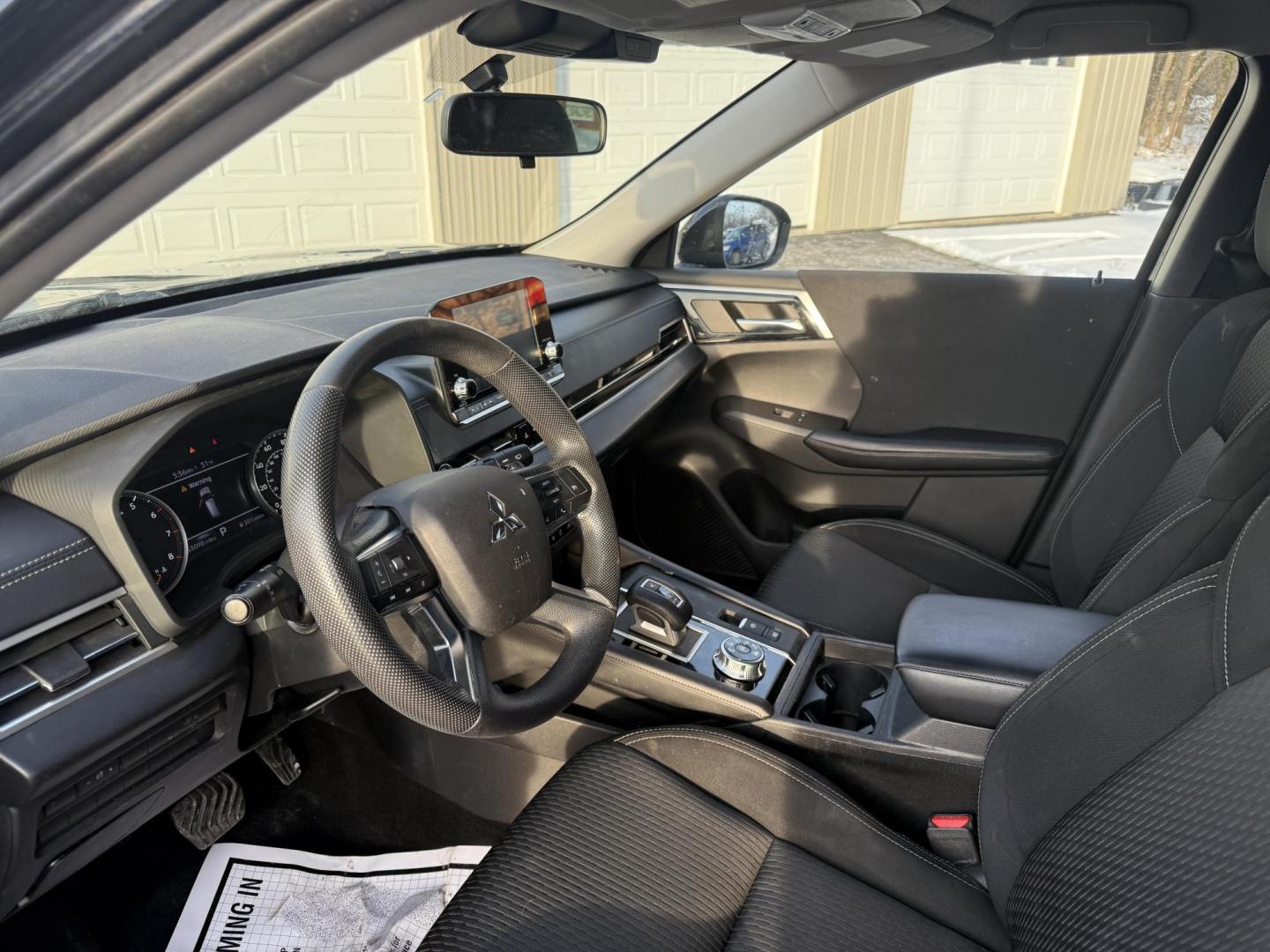 2022 Black /Black Mitsubishi Outlander ES 4WD (JA4J4TA82NZ) with an 2.5L I4 DOHC 16V engine, Automatic transmission, located at 547 E. Main St., Orwell, OH, 44076, (440) 437-5893, 41.535435, -80.847855 - Photo#14