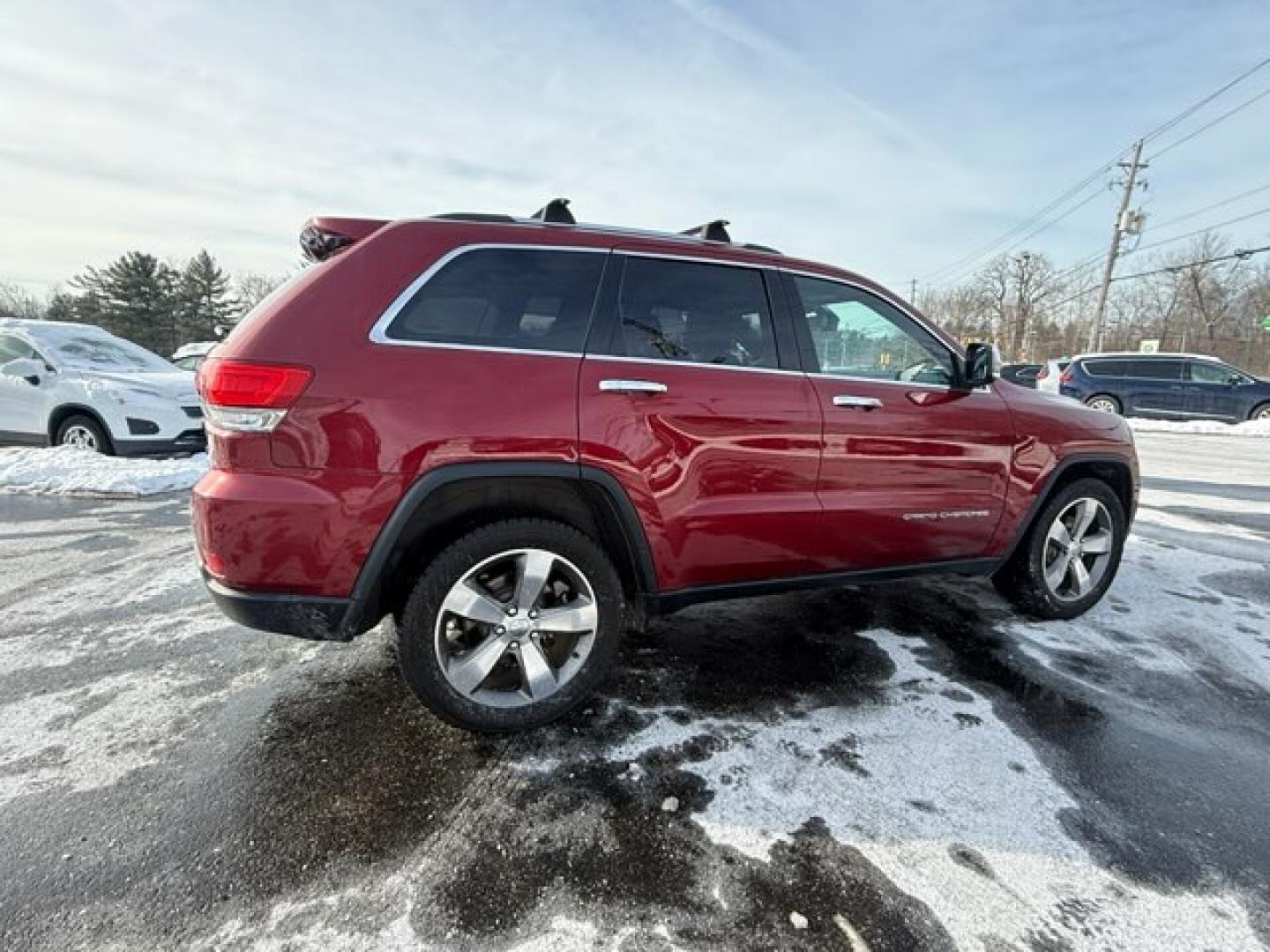 2015 Red /Black Jeep Grand Cherokee Limited 4WD (1C4RJFBG8FC) with an 3.6L V6 DOHC 24V engine, Automatic transmission, located at 11115 Chardon Rd. , Chardon, OH, 44024, (440) 214-9705, 41.580246, -81.241943 - 2015 Jeep Grand Cherokee Limited 4WD – Refined Comfort, Legendary Capability, and Smart Technology Step up to premium SUV luxury with this 2015 Jeep Grand Cherokee Limited 4WD. Powered by a proven 3.6L Pentastar V6 engine paired with an advanced 8-speed automatic transmission, this Grand Cherok - Photo#5