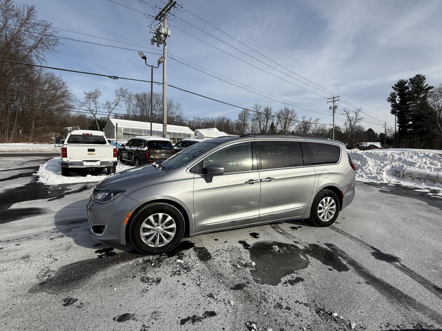 2017 Silver /Black Chrysler Pacifica Touring-L (2C4RC1BG0HR) with an 3.6L V6 DOHC 24V engine, Automatic transmission, located at 547 E. Main St., Orwell, OH, 44076, (440) 437-5893, 41.535435, -80.847855 - 2017 Chrysler Pacifica Touring L – Family-Focused Comfort, Efficiency, and Versatility Upgrade your family’s driving experience with this 2017 Chrysler Pacifica Touring L. Powered by a reliable 3.6L Pentastar V6 engine paired with a smooth 9-speed automatic transmission, this minivan delivers - Photo#9