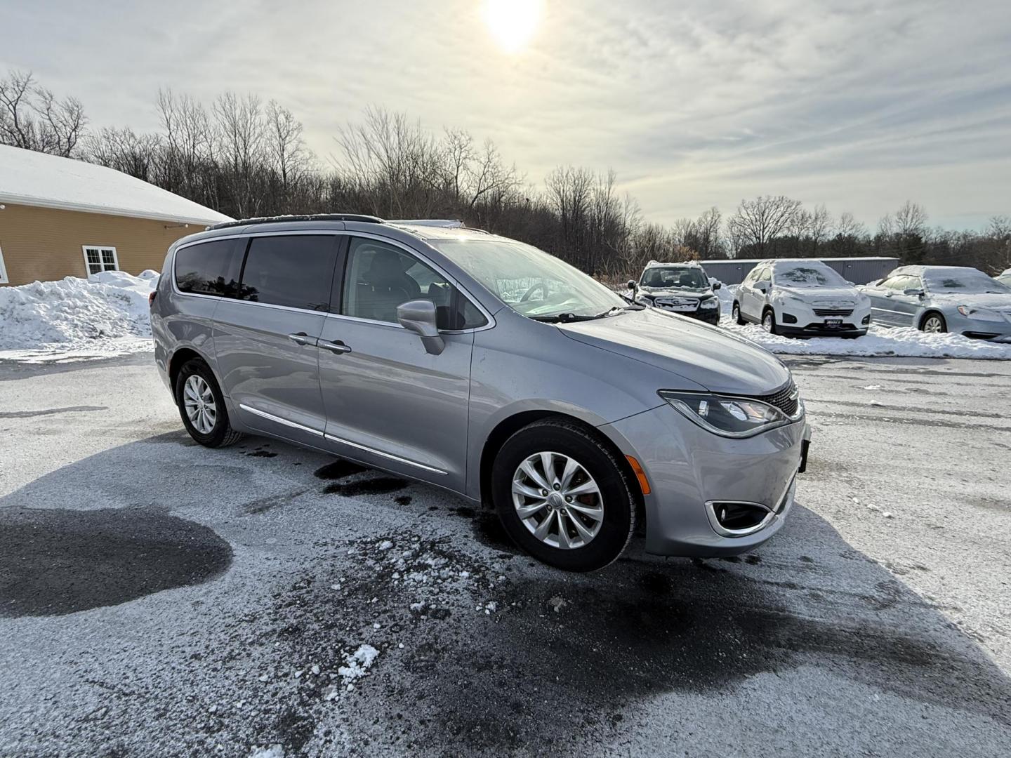 2017 Silver /Black Chrysler Pacifica Touring-L (2C4RC1BG0HR) with an 3.6L V6 DOHC 24V engine, Automatic transmission, located at 547 E. Main St., Orwell, OH, 44076, (440) 437-5893, 41.535435, -80.847855 - 2017 Chrysler Pacifica Touring L – Family-Focused Comfort, Efficiency, and Versatility Upgrade your family’s driving experience with this 2017 Chrysler Pacifica Touring L. Powered by a reliable 3.6L Pentastar V6 engine paired with a smooth 9-speed automatic transmission, this minivan delivers - Photo#3