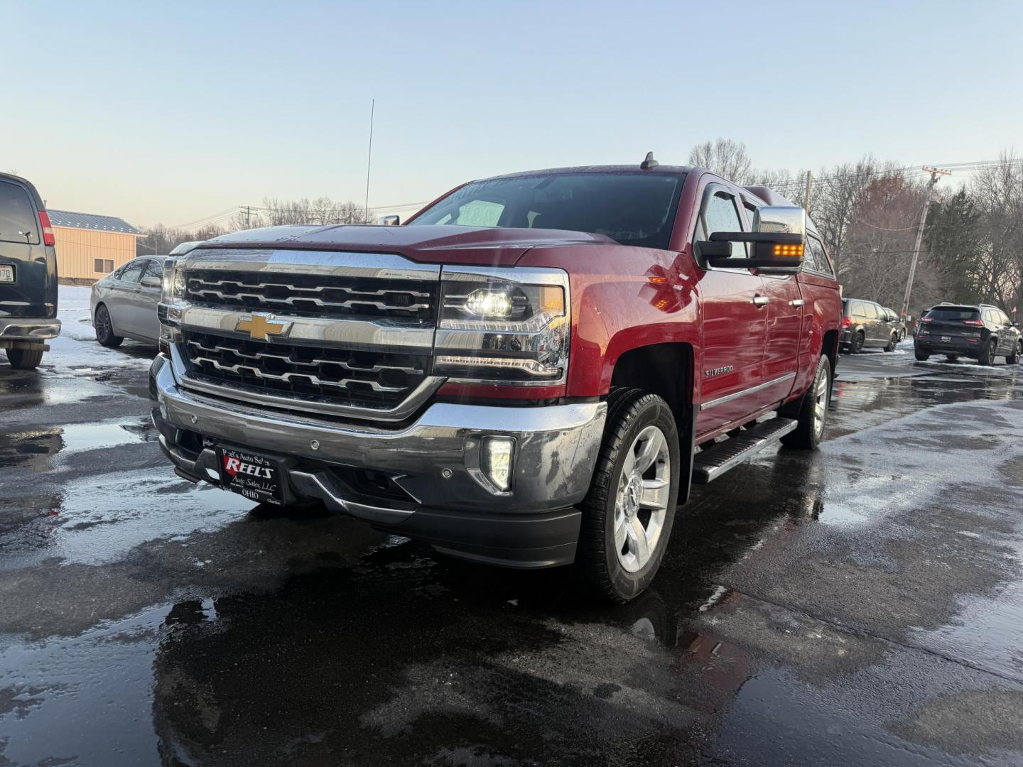 2018 Red /Black Chevrolet Silverado 1500 LTZ Crew Cab 4WD (3GCUKSEJ5JG) with an 6.2L V8 OHV 16V engine, Automatic transmission, located at 547 E. Main St., Orwell, OH, 44076, (440) 437-5893, 41.535435, -80.847855 - 2018 Chevrolet Silverado 1500 LTZ Crew Cab 4WD – Unmatched Power, Premium Comfort, and Advanced Technology Experience the perfect combination of strength, luxury, and innovation with this 2018 Chevrolet Silverado 1500 LTZ Crew Cab 4WD. Under the hood, a commanding 6.2L EcoTec3 V8 engine deliver - Photo#0