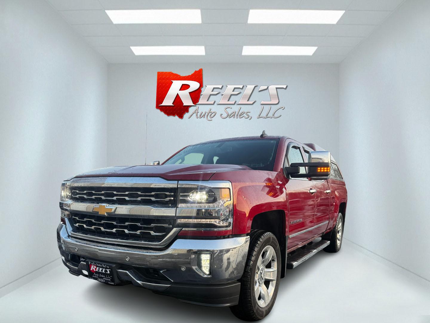 2018 Red /Black Chevrolet Silverado 1500 LTZ Crew Cab 4WD (3GCUKSEJ5JG) with an 6.2L V8 OHV 16V engine, Automatic transmission, located at 547 E. Main St., Orwell, OH, 44076, (440) 437-5893, 41.535435, -80.847855 - 2018 Chevrolet Silverado 1500 LTZ Crew Cab 4WD – Unmatched Power, Premium Comfort, and Advanced Technology Experience the perfect combination of strength, luxury, and innovation with this 2018 Chevrolet Silverado 1500 LTZ Crew Cab 4WD. Under the hood, a commanding 6.2L EcoTec3 V8 engine deliver - Photo#0