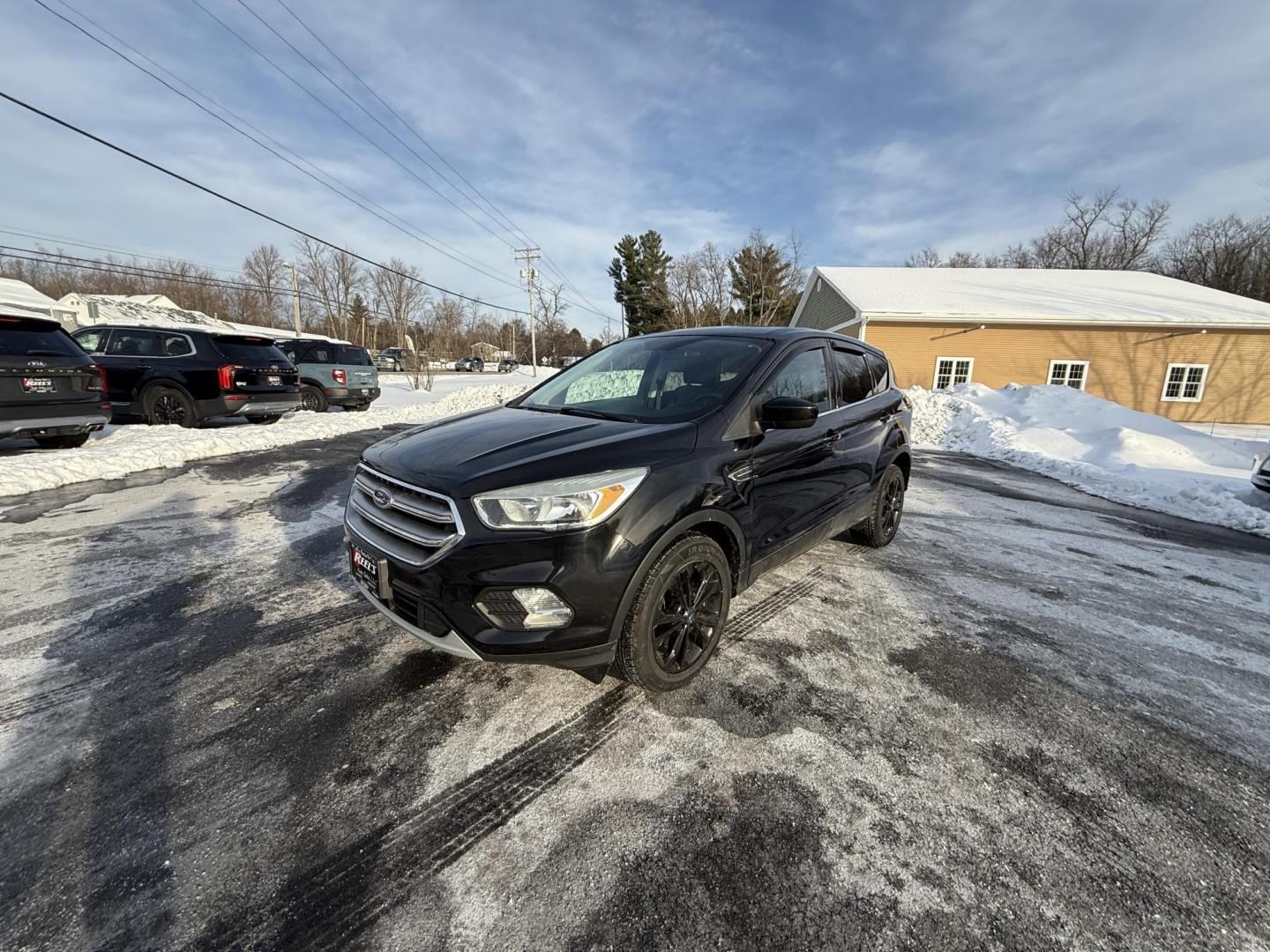 2017 Black /Black Ford Escape SE 4WD (1FMCU9GDXHU) with an 1.5L I4 DOHC 16V Turbo engine, Automatic transmission, located at 11115 Chardon Rd. , Chardon, OH, 44024, (440) 214-9705, 41.580246, -81.241943 - 2017 Ford Escape SE 4WD – Versatile Efficiency, Comfort, and Confidence Upgrade your daily drive with this 2017 Ford Escape SE 4WD, combining smart features and practical performance. Powered by a responsive 1.5L turbocharged EcoTec I4 engine with a 6-speed automatic transmission, this SUV deli - Photo#1