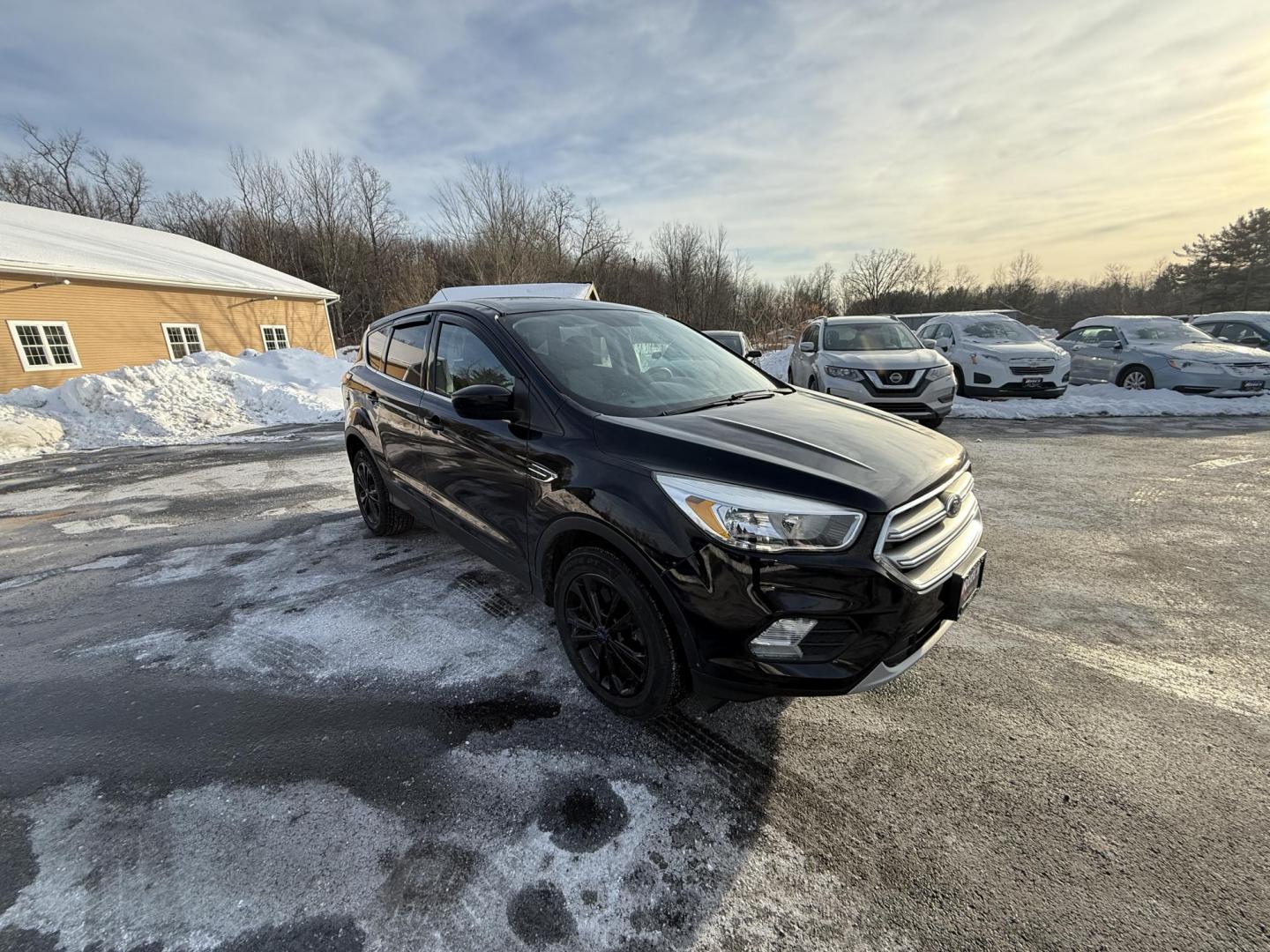 2017 Black /Black Ford Escape SE 4WD (1FMCU9GDXHU) with an 1.5L I4 DOHC 16V Turbo engine, Automatic transmission, located at 11115 Chardon Rd. , Chardon, OH, 44024, (440) 214-9705, 41.580246, -81.241943 - 2017 Ford Escape SE 4WD – Versatile Efficiency, Comfort, and Confidence Upgrade your daily drive with this 2017 Ford Escape SE 4WD, combining smart features and practical performance. Powered by a responsive 1.5L turbocharged EcoTec I4 engine with a 6-speed automatic transmission, this SUV deli - Photo#3