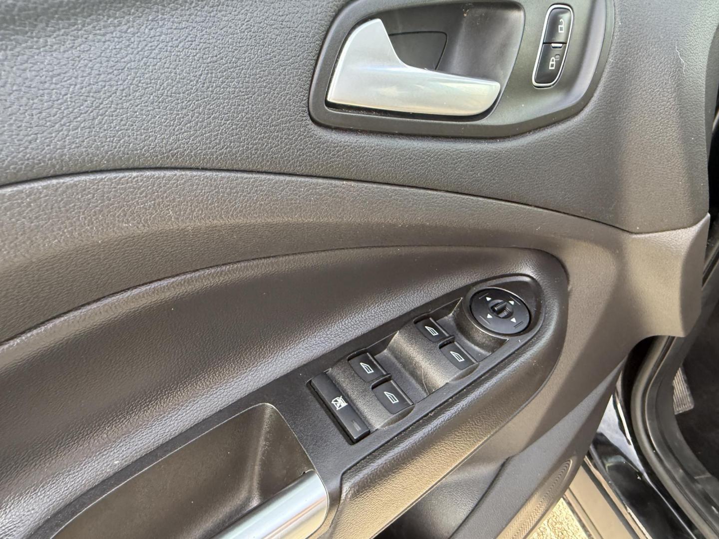 2017 Black /Black Ford Escape SE 4WD (1FMCU9GDXHU) with an 1.5L I4 DOHC 16V Turbo engine, Automatic transmission, located at 11115 Chardon Rd. , Chardon, OH, 44024, (440) 214-9705, 41.580246, -81.241943 - 2017 Ford Escape SE 4WD – Versatile Efficiency, Comfort, and Confidence Upgrade your daily drive with this 2017 Ford Escape SE 4WD, combining smart features and practical performance. Powered by a responsive 1.5L turbocharged EcoTec I4 engine with a 6-speed automatic transmission, this SUV deli - Photo#15