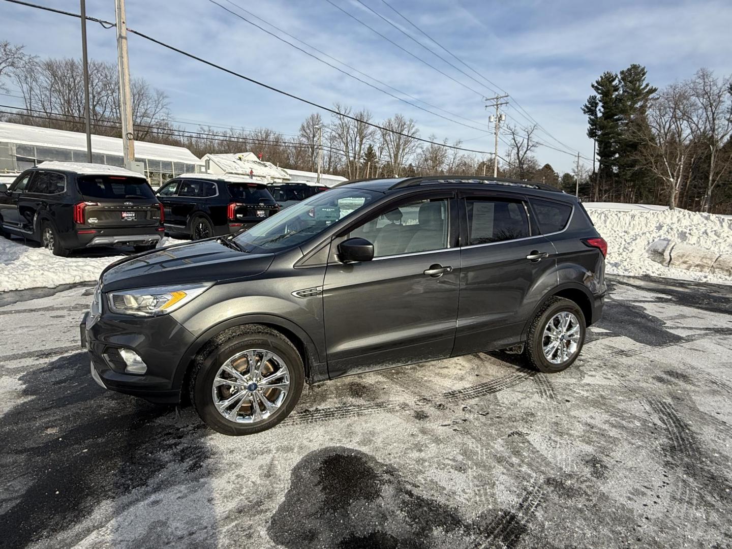2019 Gray /Gray Ford Escape SEL 4WD (1FMCU9HDXKU) with an 1.5L I4 DOHC 16V Turbo engine, Automatic transmission, located at 11115 Chardon Rd. , Chardon, OH, 44024, (440) 214-9705, 41.580246, -81.241943 - 2019 Ford Escape SEL 4WD – Stylish Comfort, Advanced Safety, and Efficient Performance Elevate your driving experience with this 2019 Ford Escape SEL 4WD. Powered by a fuel-efficient 1.5L turbocharged EcoTec I4 engine and a smooth 6-speed automatic transmission, this SUV delivers up to 28 MPG h - Photo#11