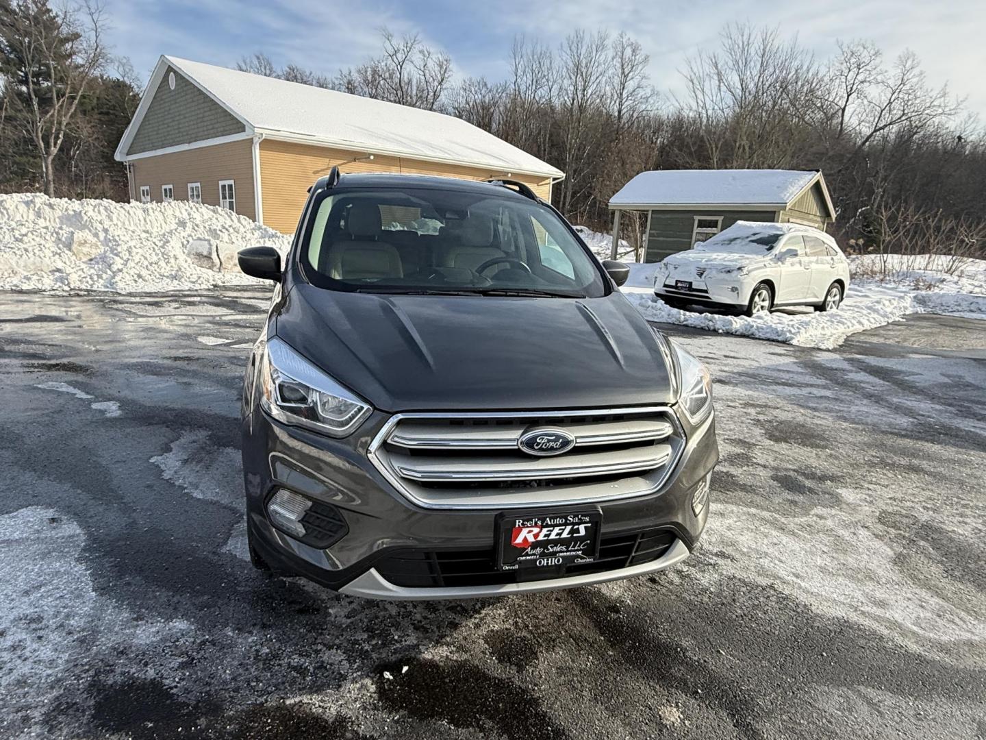 2019 Gray /Gray Ford Escape SEL 4WD (1FMCU9HDXKU) with an 1.5L I4 DOHC 16V Turbo engine, Automatic transmission, located at 11115 Chardon Rd. , Chardon, OH, 44024, (440) 214-9705, 41.580246, -81.241943 - 2019 Ford Escape SEL 4WD – Stylish Comfort, Advanced Safety, and Efficient Performance Elevate your driving experience with this 2019 Ford Escape SEL 4WD. Powered by a fuel-efficient 1.5L turbocharged EcoTec I4 engine and a smooth 6-speed automatic transmission, this SUV delivers up to 28 MPG h - Photo#1