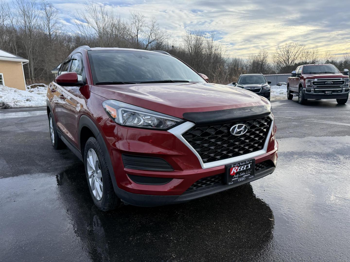 2021 Red /Black Hyundai Tucson Value AWD (KM8J3CA47MU) with an 2.0L I4 DOHC 16V engine, Automatic transmission, located at 11115 Chardon Rd. , Chardon, OH, 44024, (440) 214-9705, 41.580246, -81.241943 - 2021 Hyundai Tucson Value AWD – Advanced Safety, Modern Comfort, and All-Weather Capability Discover the perfect combination of reliability, technology, and comfort with this 2021 Hyundai Tucson Value AWD. Powered by a fuel-efficient 2.0L I4 GDI engine and a smooth 6-speed automatic transmissio - Photo#1
