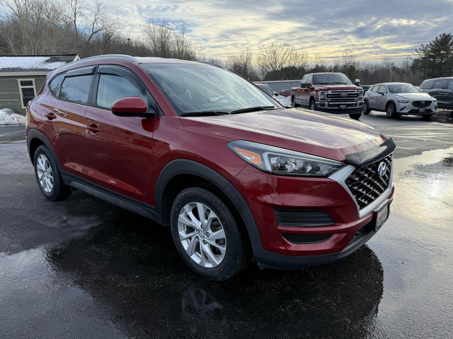 2021 Red /Black Hyundai Tucson Value AWD (KM8J3CA47MU) with an 2.0L I4 DOHC 16V engine, Automatic transmission, located at 11115 Chardon Rd. , Chardon, OH, 44024, (440) 214-9705, 41.580246, -81.241943 - 2021 Hyundai Tucson Value AWD – Advanced Safety, Modern Comfort, and All-Weather Capability Discover the perfect combination of reliability, technology, and comfort with this 2021 Hyundai Tucson Value AWD. Powered by a fuel-efficient 2.0L I4 GDI engine and a smooth 6-speed automatic transmissio - Photo#2