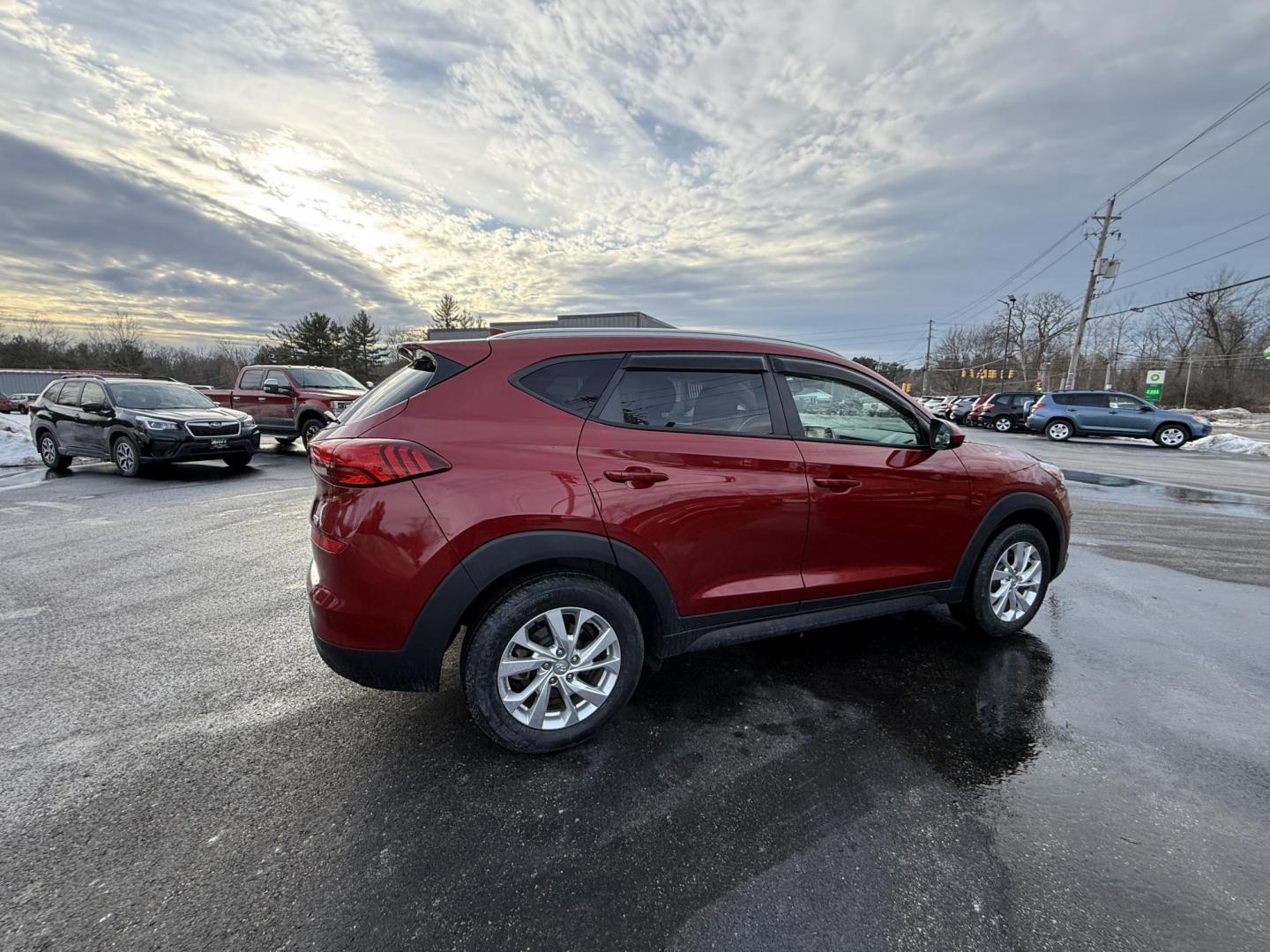 2021 Red /Black Hyundai Tucson Value AWD (KM8J3CA47MU) with an 2.0L I4 DOHC 16V engine, Automatic transmission, located at 11115 Chardon Rd. , Chardon, OH, 44024, (440) 214-9705, 41.580246, -81.241943 - 2021 Hyundai Tucson Value AWD – Advanced Safety, Modern Comfort, and All-Weather Capability Discover the perfect combination of reliability, technology, and comfort with this 2021 Hyundai Tucson Value AWD. Powered by a fuel-efficient 2.0L I4 GDI engine and a smooth 6-speed automatic transmissio - Photo#4