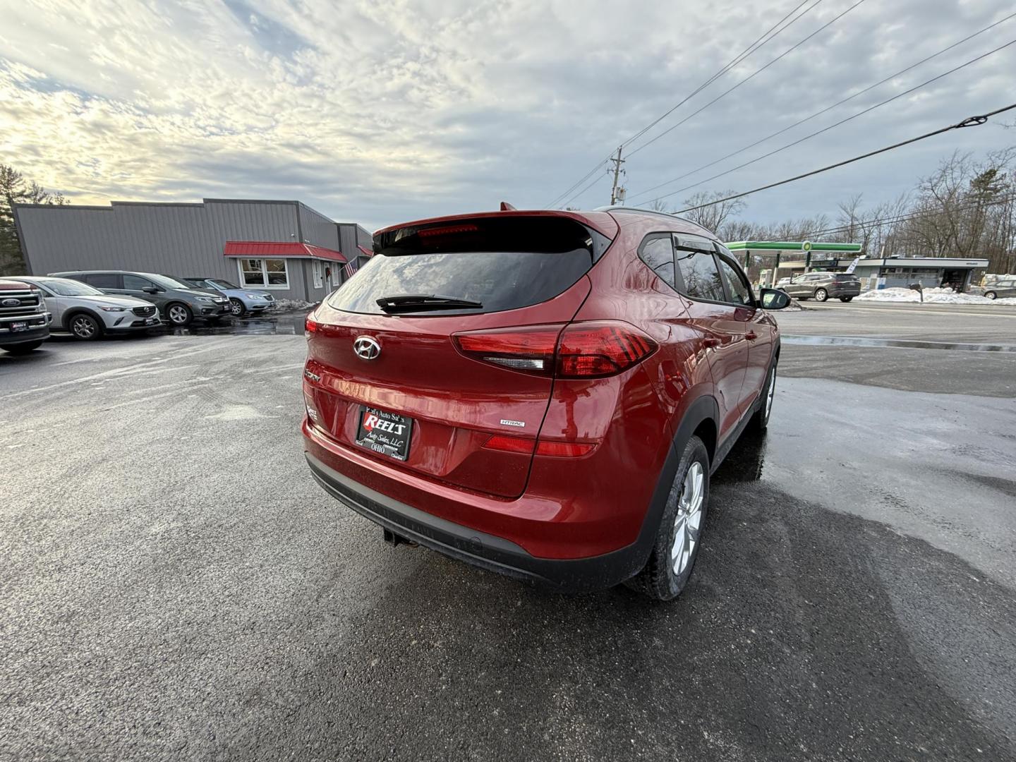 2021 Red /Black Hyundai Tucson Value AWD (KM8J3CA47MU) with an 2.0L I4 DOHC 16V engine, Automatic transmission, located at 11115 Chardon Rd. , Chardon, OH, 44024, (440) 214-9705, 41.580246, -81.241943 - 2021 Hyundai Tucson Value AWD – Advanced Safety, Modern Comfort, and All-Weather Capability Discover the perfect combination of reliability, technology, and comfort with this 2021 Hyundai Tucson Value AWD. Powered by a fuel-efficient 2.0L I4 GDI engine and a smooth 6-speed automatic transmissio - Photo#5