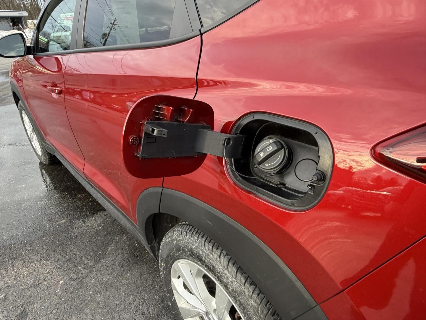 2021 Red /Black Hyundai Tucson Value AWD (KM8J3CA47MU) with an 2.0L I4 DOHC 16V engine, Automatic transmission, located at 11115 Chardon Rd. , Chardon, OH, 44024, (440) 214-9705, 41.580246, -81.241943 - 2021 Hyundai Tucson Value AWD – Advanced Safety, Modern Comfort, and All-Weather Capability Discover the perfect combination of reliability, technology, and comfort with this 2021 Hyundai Tucson Value AWD. Powered by a fuel-efficient 2.0L I4 GDI engine and a smooth 6-speed automatic transmissio - Photo#8