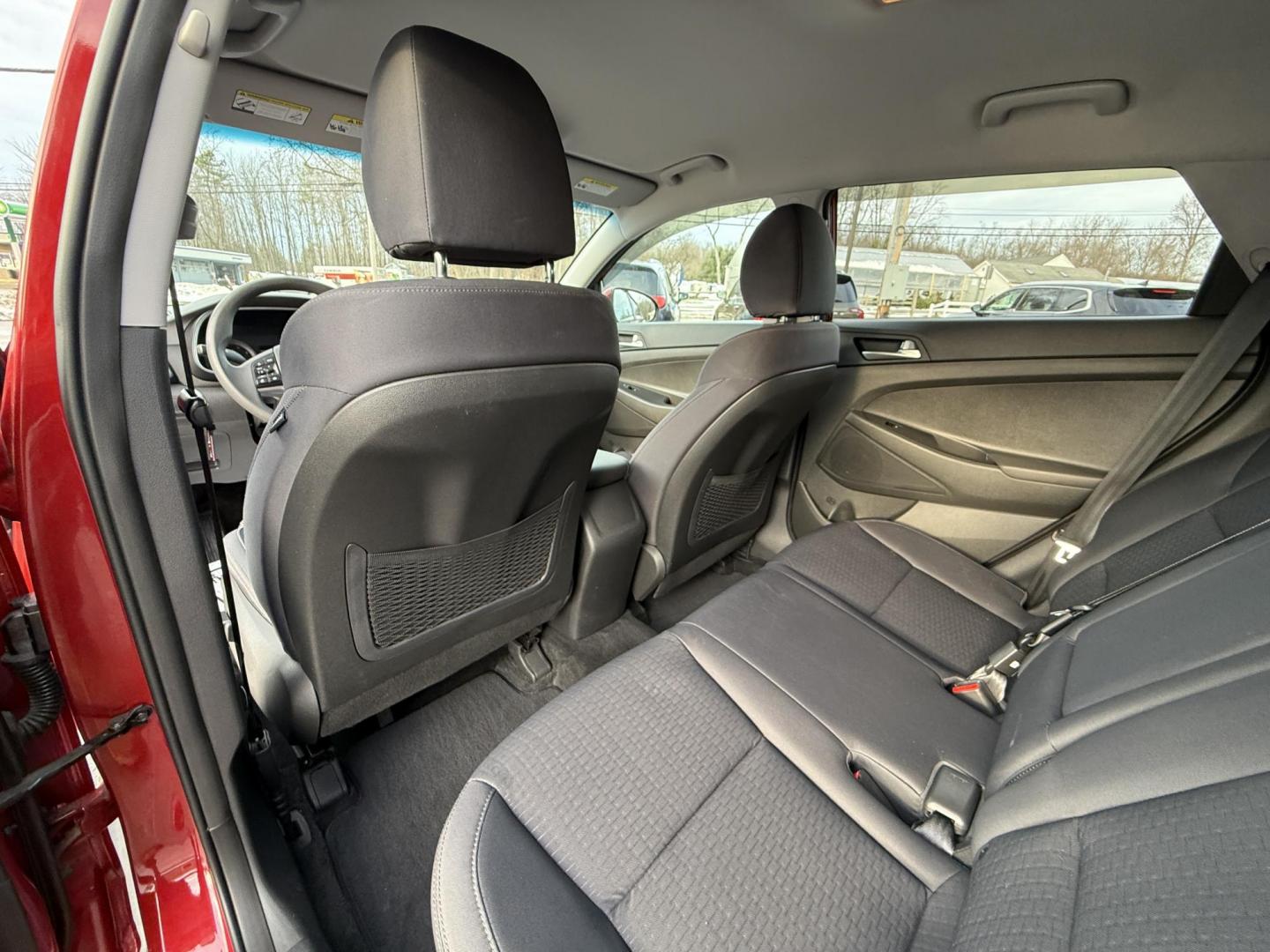 2021 Red /Black Hyundai Tucson Value AWD (KM8J3CA47MU) with an 2.0L I4 DOHC 16V engine, Automatic transmission, located at 11115 Chardon Rd. , Chardon, OH, 44024, (440) 214-9705, 41.580246, -81.241943 - 2021 Hyundai Tucson Value AWD – Advanced Safety, Modern Comfort, and All-Weather Capability Discover the perfect combination of reliability, technology, and comfort with this 2021 Hyundai Tucson Value AWD. Powered by a fuel-efficient 2.0L I4 GDI engine and a smooth 6-speed automatic transmissio - Photo#35