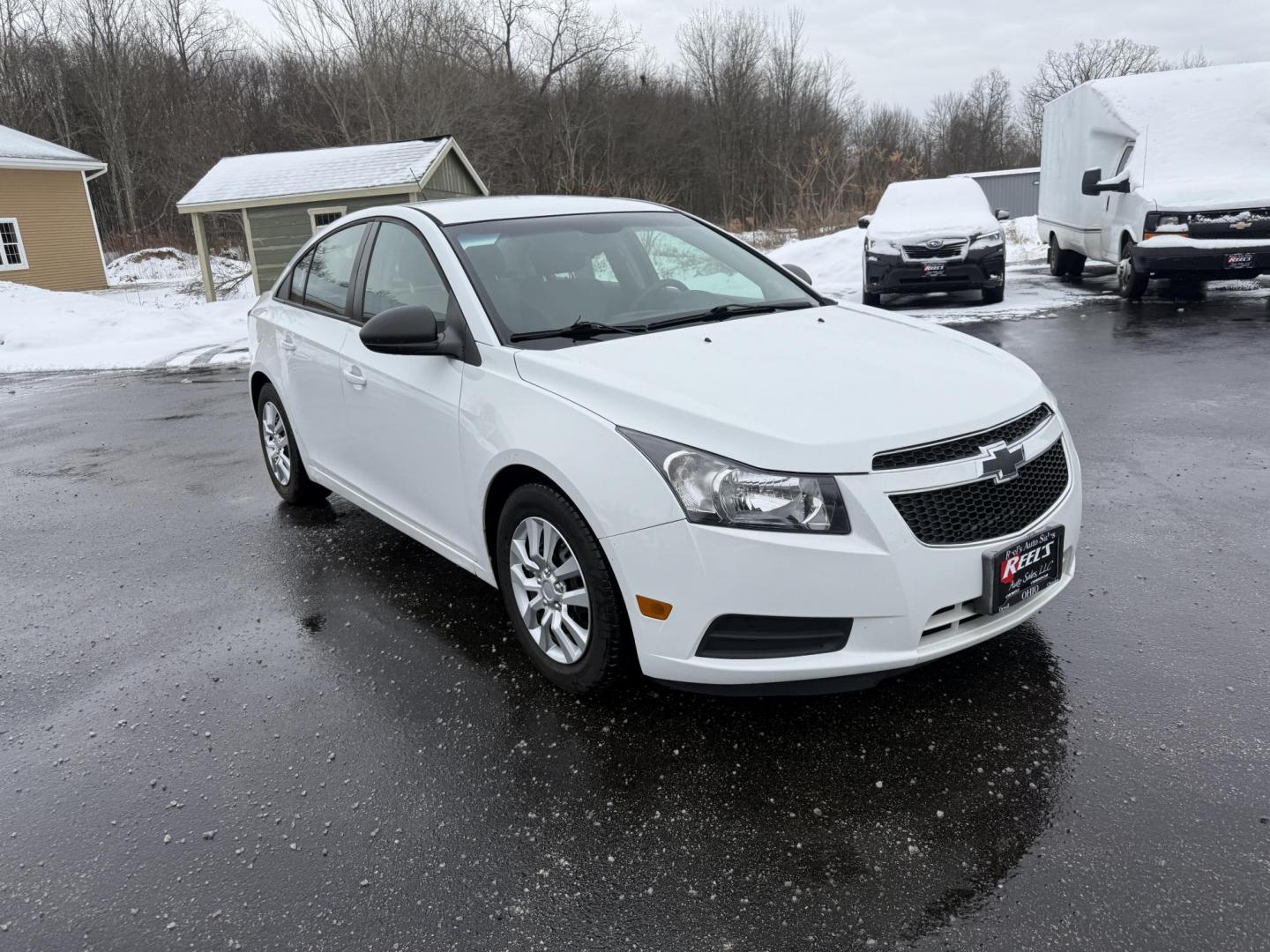 2014 White /Black Chevrolet Cruze LS Auto (1G1PA5SH9E7) with an 1.8L I4 DOHC 16V engine, Automatic transmission, located at 11115 Chardon Rd. , Chardon, OH, 44024, (440) 214-9705, 41.580246, -81.241943 - 2014 Chevrolet Cruze LS – Efficient, Safe, and Dependable Compact Sedan Enjoy reliable performance and impressive fuel economy with this 2014 Chevrolet Cruze LS. Powered by a 1.8L EcoTec I4 engine paired with a 6-speed automatic transmission, this sedan delivers up to 32 MPG highway and 26 MPG - Photo#2