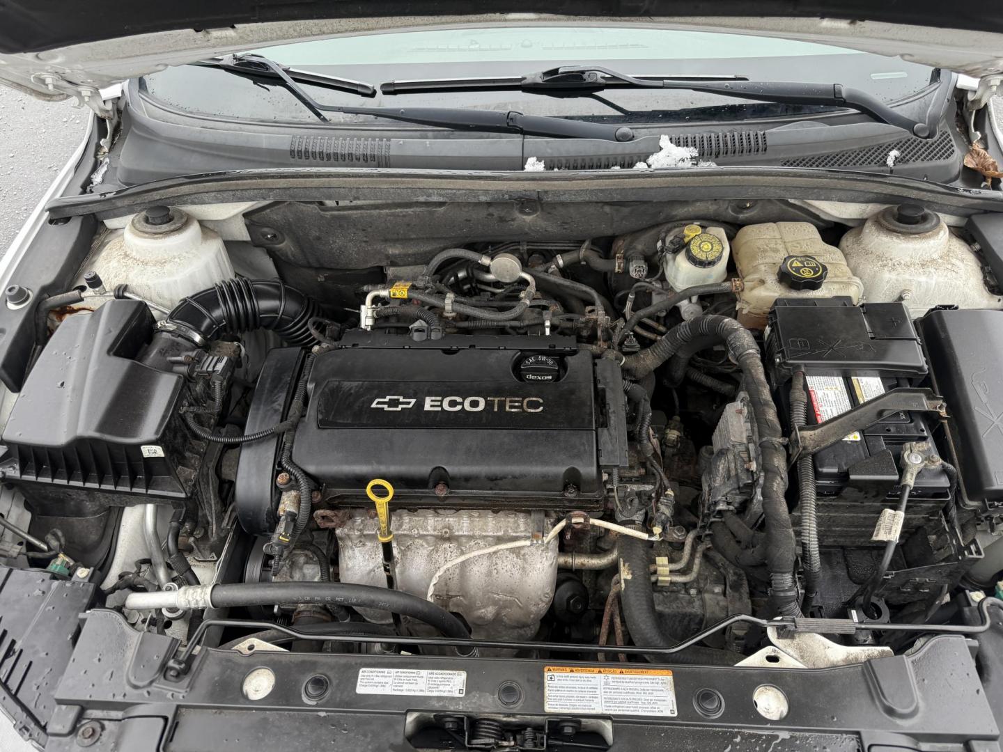 2014 White /Black Chevrolet Cruze LS Auto (1G1PA5SH9E7) with an 1.8L I4 DOHC 16V engine, Automatic transmission, located at 11115 Chardon Rd. , Chardon, OH, 44024, (440) 214-9705, 41.580246, -81.241943 - 2014 Chevrolet Cruze LS – Efficient, Safe, and Dependable Compact Sedan Enjoy reliable performance and impressive fuel economy with this 2014 Chevrolet Cruze LS. Powered by a 1.8L EcoTec I4 engine paired with a 6-speed automatic transmission, this sedan delivers up to 32 MPG highway and 26 MPG - Photo#14