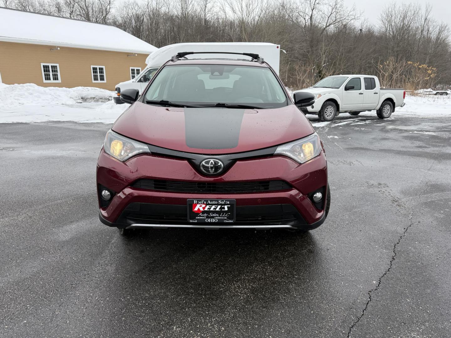 2018 Red /Black Toyota RAV4 Adventure AWD (2T3RFREV8JW) with an 2.5L I4 DOHC 16V engine, Automatic transmission, located at 11115 Chardon Rd. , Chardon, OH, 44024, (440) 214-9705, 41.580246, -81.241943 - One Owner ---- 2018 Toyota RAV4 Adventure AWD – Rugged Versatility, Advanced Safety, and Everyday Comfort Get ready for your next adventure with this 2018 Toyota RAV4 Adventure AWD. Powered by a reliable 2.5L I4 engine and a smooth 6-speed automatic transmission, this SUV delivers impressive ef - Photo#1