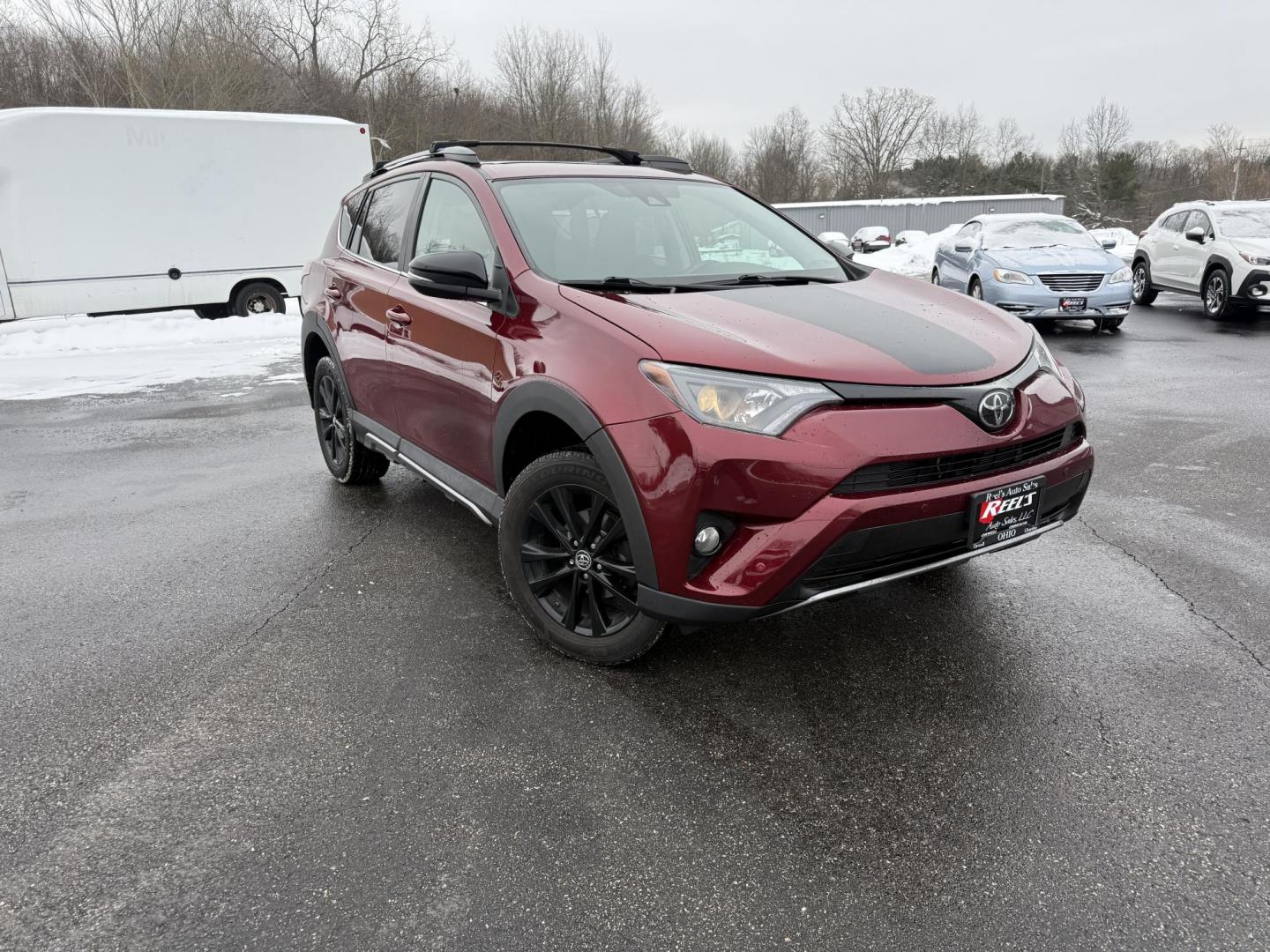 2018 Red /Black Toyota RAV4 Adventure AWD (2T3RFREV8JW) with an 2.5L I4 DOHC 16V engine, Automatic transmission, located at 11115 Chardon Rd. , Chardon, OH, 44024, (440) 214-9705, 41.580246, -81.241943 - One Owner ---- 2018 Toyota RAV4 Adventure AWD – Rugged Versatility, Advanced Safety, and Everyday Comfort Get ready for your next adventure with this 2018 Toyota RAV4 Adventure AWD. Powered by a reliable 2.5L I4 engine and a smooth 6-speed automatic transmission, this SUV delivers impressive ef - Photo#2