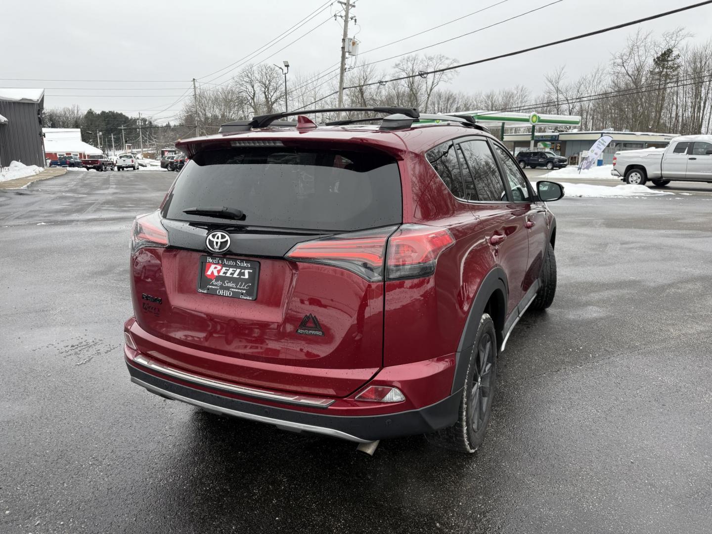 2018 Red /Black Toyota RAV4 Adventure AWD (2T3RFREV8JW) with an 2.5L I4 DOHC 16V engine, Automatic transmission, located at 11115 Chardon Rd. , Chardon, OH, 44024, (440) 214-9705, 41.580246, -81.241943 - One Owner ---- 2018 Toyota RAV4 Adventure AWD – Rugged Versatility, Advanced Safety, and Everyday Comfort Get ready for your next adventure with this 2018 Toyota RAV4 Adventure AWD. Powered by a reliable 2.5L I4 engine and a smooth 6-speed automatic transmission, this SUV delivers impressive ef - Photo#19