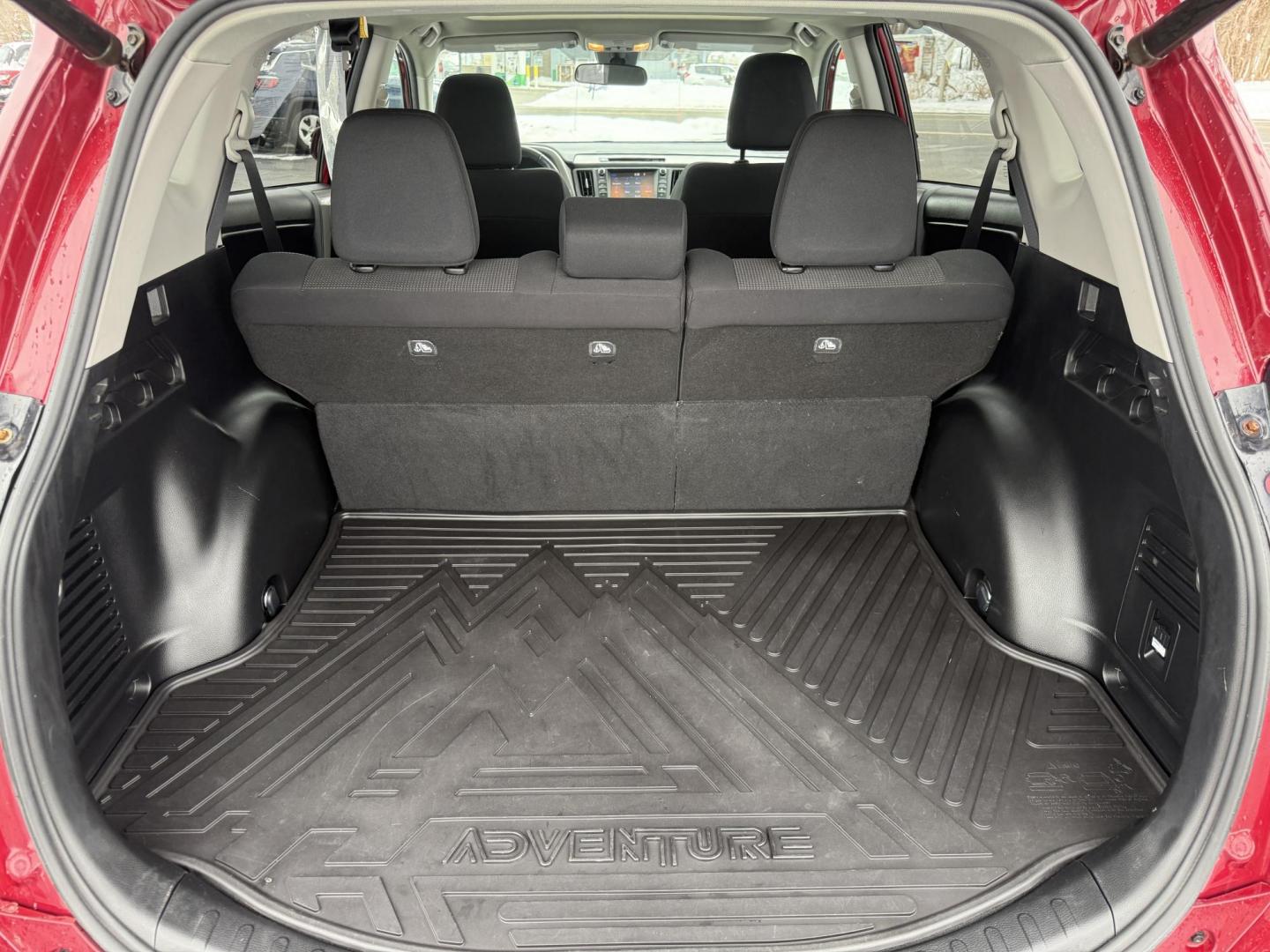 2018 Red /Black Toyota RAV4 Adventure AWD (2T3RFREV8JW) with an 2.5L I4 DOHC 16V engine, Automatic transmission, located at 11115 Chardon Rd. , Chardon, OH, 44024, (440) 214-9705, 41.580246, -81.241943 - One Owner ---- 2018 Toyota RAV4 Adventure AWD – Rugged Versatility, Advanced Safety, and Everyday Comfort Get ready for your next adventure with this 2018 Toyota RAV4 Adventure AWD. Powered by a reliable 2.5L I4 engine and a smooth 6-speed automatic transmission, this SUV delivers impressive ef - Photo#37