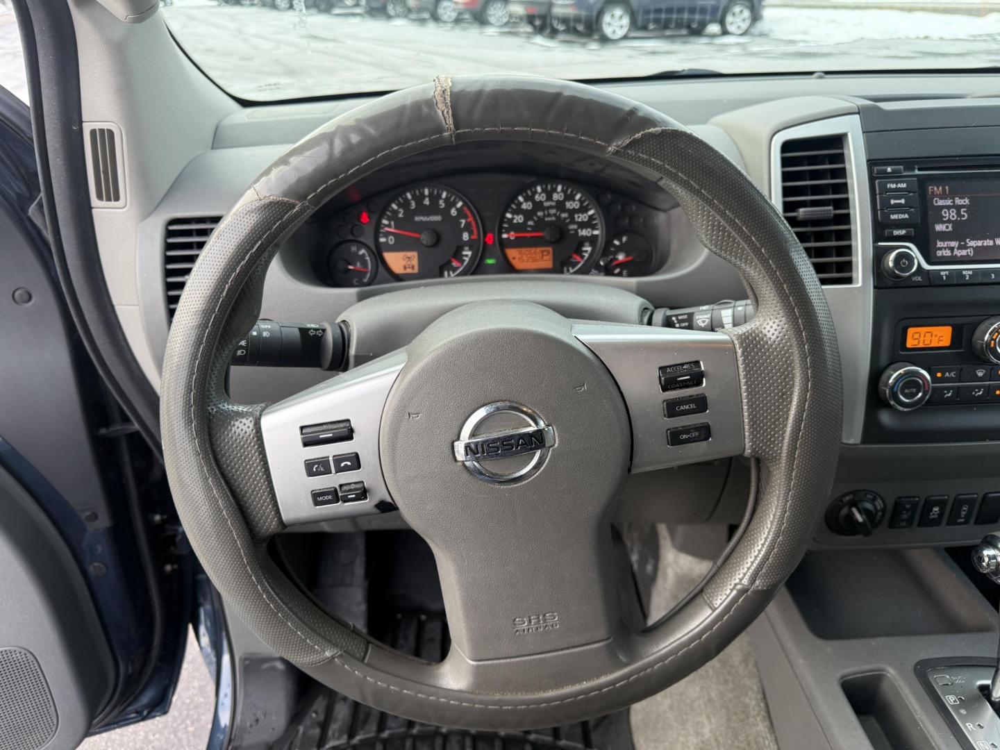 2015 Blue /Gray Nissan Frontier SV Crew Cab 5AT 4WD (1N6AD0EV1FN) with an 4.0L V6 DOHC 24V engine, Automatic transmission, located at 11115 Chardon Rd. , Chardon, OH, 44024, (440) 214-9705, 41.580246, -81.241943 - One Owner ---- 2015 Nissan Frontier SV Crew Cab 4WD – Rugged Durability, Smart Features, and Trusted Capability Tackle every job and adventure with confidence in this 2015 Nissan Frontier SV Crew Cab 4WD. Powered by a robust 4.0L V6 engine and a smooth 5-speed automatic transmission, this truck - Photo#9