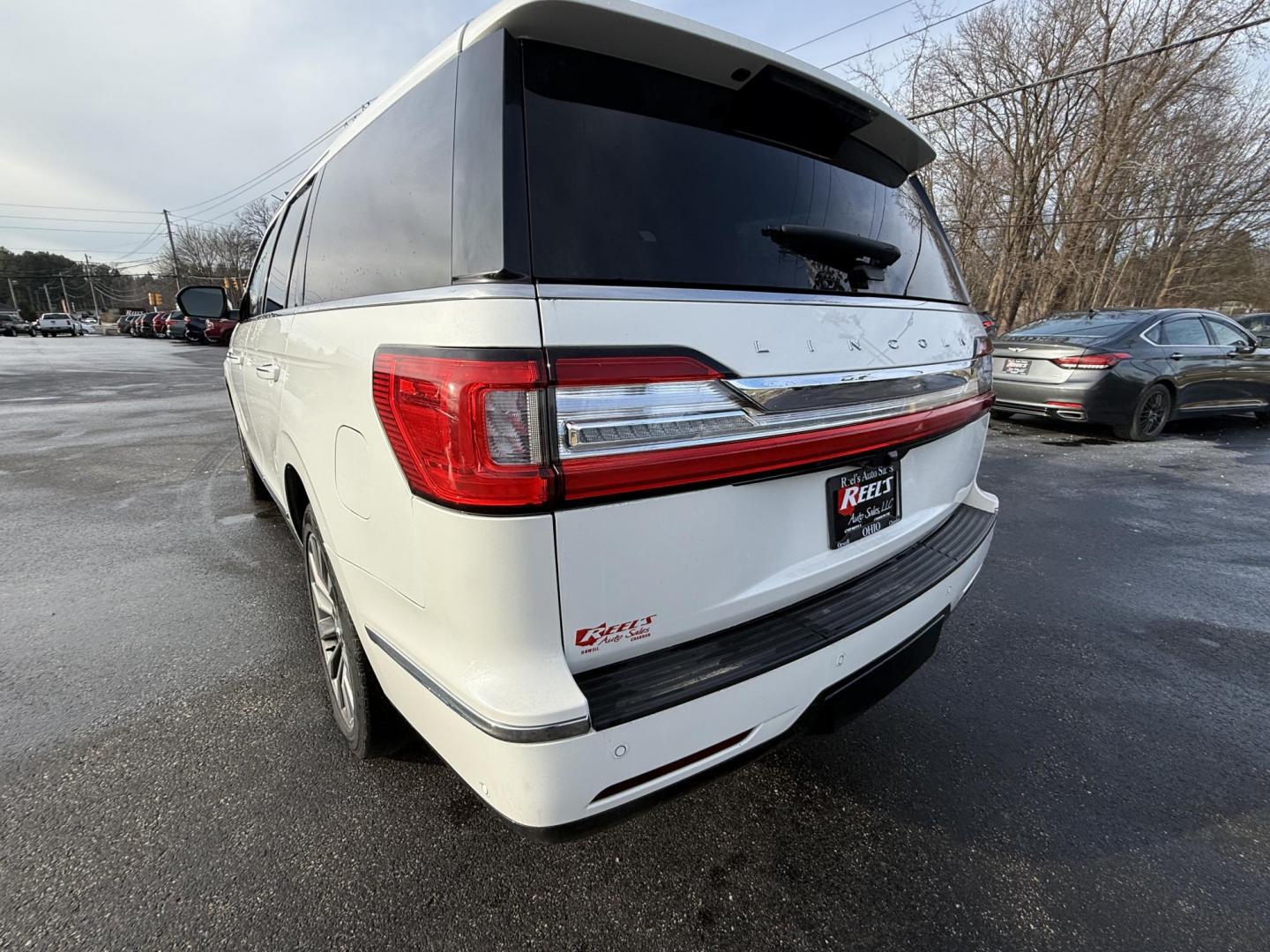 2020 White /Black Lincoln Navigator Reserve 4WD (5LMJJ2LT6LE) with an 3.5L V6 DOHC 24V TWIN TURBO engine, Automatic transmission, located at 11115 Chardon Rd. , Chardon, OH, 44024, (440) 214-9705, 41.580246, -81.241943 - 2020 Lincoln Navigator Reserve 4WD – Unrivaled Luxury, Twin-Turbo Power, and Advanced Technology Experience the ultimate in luxury and capability with this 2020 Lincoln Navigator Reserve 4WD. Beneath the hood, a 3.5L Twin Turbo High Output EcoBoost V6 engine delivers an exhilarating 450 horsepo - Photo#7