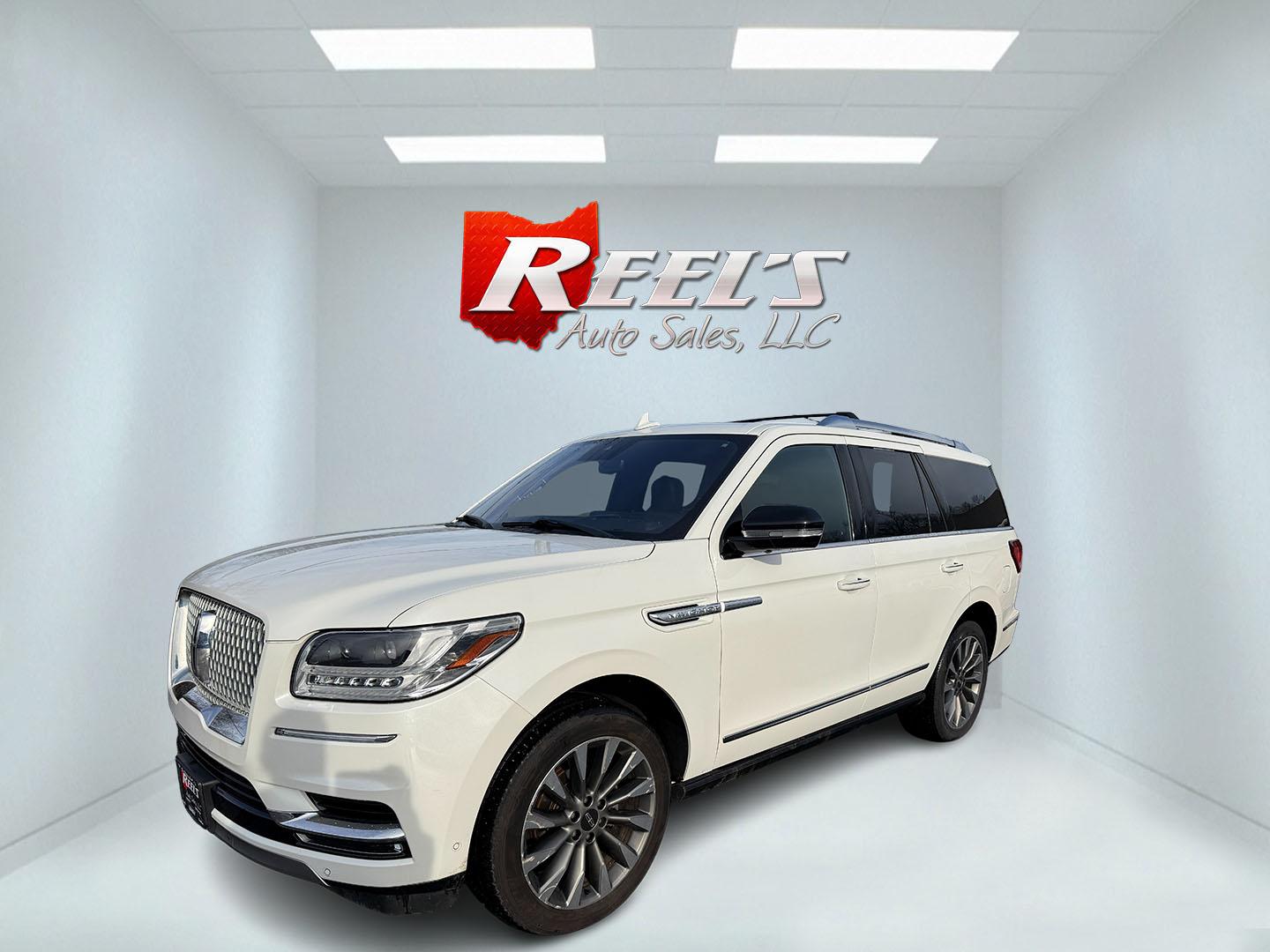 2020 White /Black Lincoln Navigator Reserve 4WD (5LMJJ2LT6LE) with an 3.5L V6 DOHC 24V TWIN TURBO engine, Automatic transmission, located at 547 E. Main St., Orwell, OH, 44076, (440) 437-5893, 41.535435, -80.847855 - 2020 Lincoln Navigator Reserve 4WD – Unrivaled Luxury, Twin-Turbo Power, and Advanced Technology Experience the ultimate in luxury and capability with this 2020 Lincoln Navigator Reserve 4WD. Beneath the hood, a 3.5L Twin Turbo High Output EcoBoost V6 engine delivers an exhilarating 450 horsepo - Photo#0