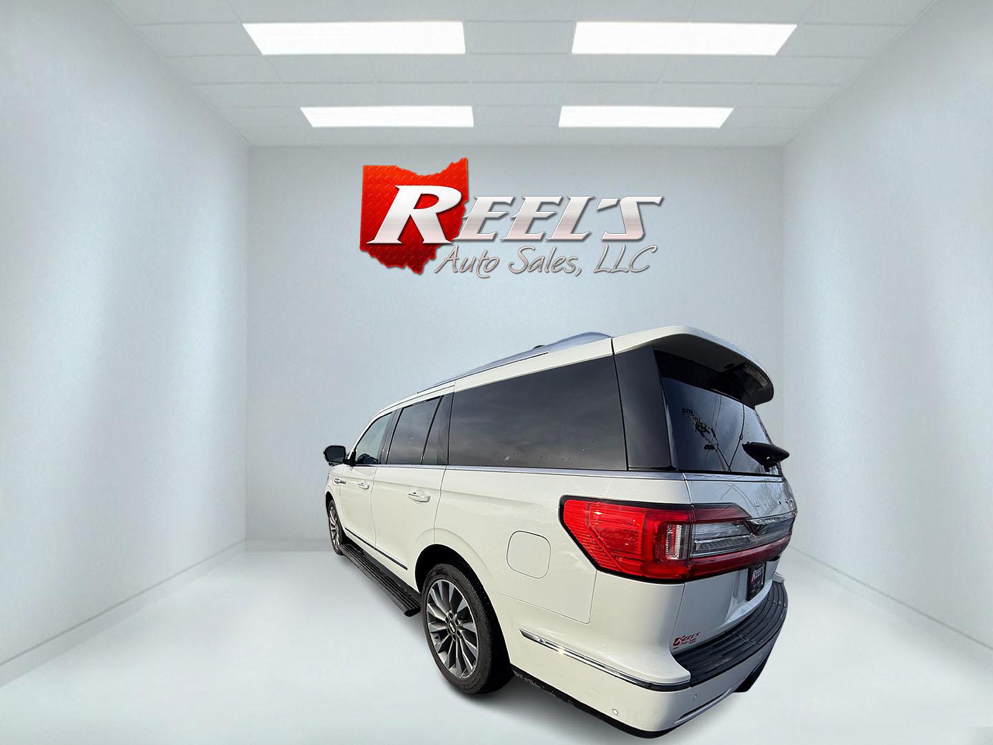 2020 White /Black Lincoln Navigator Reserve 4WD (5LMJJ2LT6LE) with an 3.5L V6 DOHC 24V TWIN TURBO engine, Automatic transmission, located at 547 E. Main St., Orwell, OH, 44076, (440) 437-5893, 41.535435, -80.847855 - 2020 Lincoln Navigator Reserve 4WD – Unrivaled Luxury, Twin-Turbo Power, and Advanced Technology Experience the ultimate in luxury and capability with this 2020 Lincoln Navigator Reserve 4WD. Beneath the hood, a 3.5L Twin Turbo High Output EcoBoost V6 engine delivers an exhilarating 450 horsepo - Photo#5