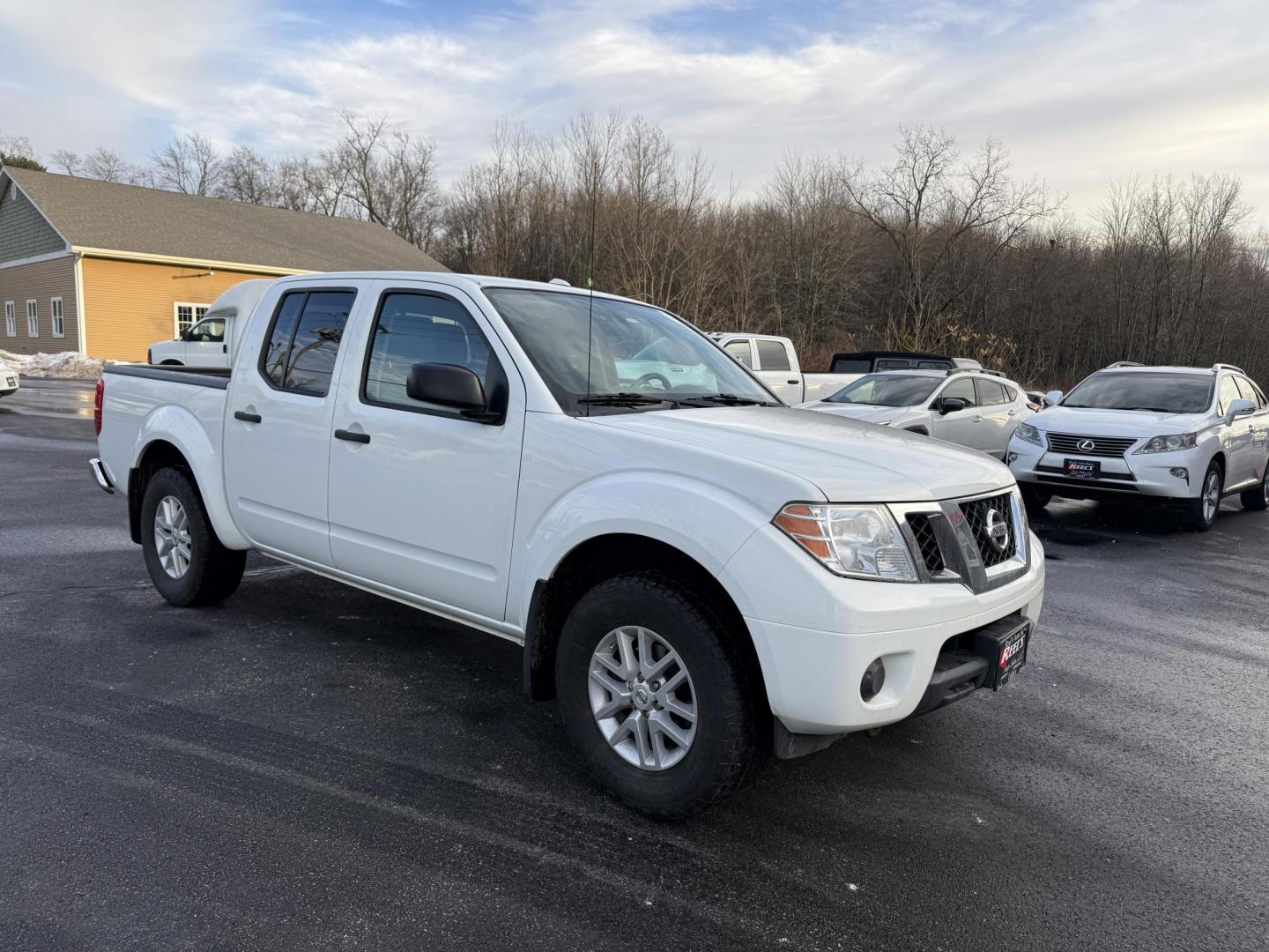 2017 White /Gray Nissan Frontier SV Crew Cab 5AT 4WD (1N6AD0EV5HN) with an 4.0L V6 DOHC 24V engine, Automatic transmission, located at 11115 Chardon Rd. , Chardon, OH, 44024, (440) 214-9705, 41.580246, -81.241943 - 2017 Nissan Frontier SV Crew Cab 4WD – Rugged Capability, Modern Convenience, and Proven Reliability Take on any road or job with confidence in this 2017 Nissan Frontier SV Crew Cab 4WD. Powered by a robust 4.0L V6 engine and a smooth 5-speed automatic transmission, this truck delivers the musc - Photo#2