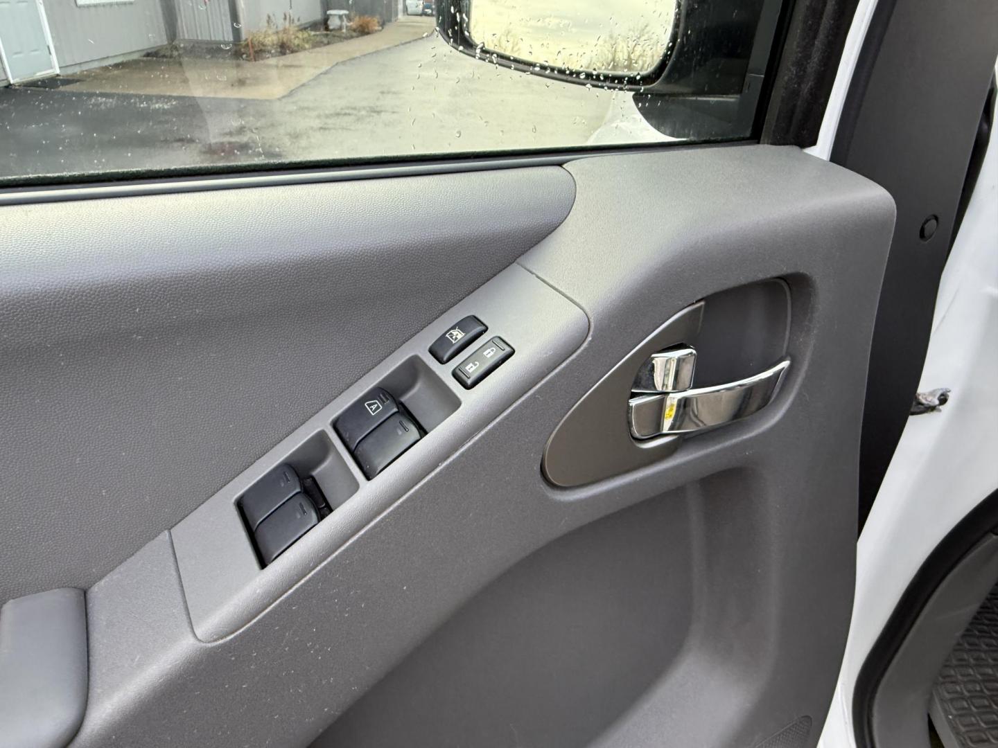 2017 White /Gray Nissan Frontier SV Crew Cab 5AT 4WD (1N6AD0EV5HN) with an 4.0L V6 DOHC 24V engine, Automatic transmission, located at 11115 Chardon Rd. , Chardon, OH, 44024, (440) 214-9705, 41.580246, -81.241943 - 2017 Nissan Frontier SV Crew Cab 4WD – Rugged Capability, Modern Convenience, and Proven Reliability Take on any road or job with confidence in this 2017 Nissan Frontier SV Crew Cab 4WD. Powered by a robust 4.0L V6 engine and a smooth 5-speed automatic transmission, this truck delivers the musc - Photo#21