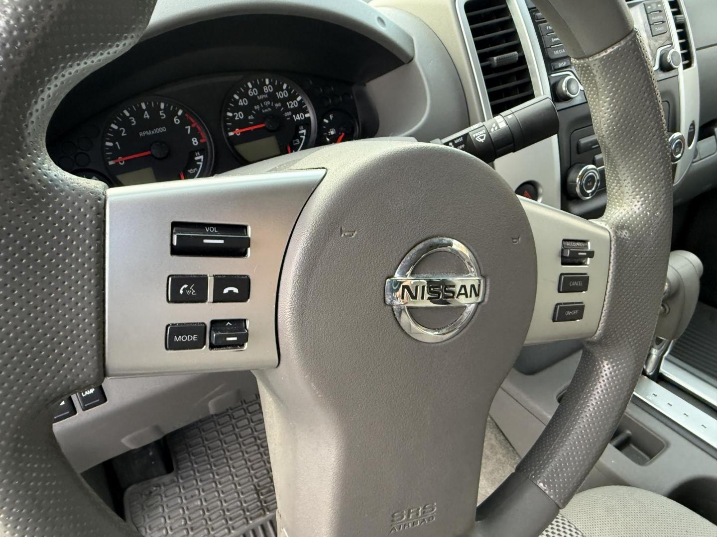 2017 White /Gray Nissan Frontier SV Crew Cab 5AT 4WD (1N6AD0EV5HN) with an 4.0L V6 DOHC 24V engine, Automatic transmission, located at 11115 Chardon Rd. , Chardon, OH, 44024, (440) 214-9705, 41.580246, -81.241943 - 2017 Nissan Frontier SV Crew Cab 4WD – Rugged Capability, Modern Convenience, and Proven Reliability Take on any road or job with confidence in this 2017 Nissan Frontier SV Crew Cab 4WD. Powered by a robust 4.0L V6 engine and a smooth 5-speed automatic transmission, this truck delivers the musc - Photo#4