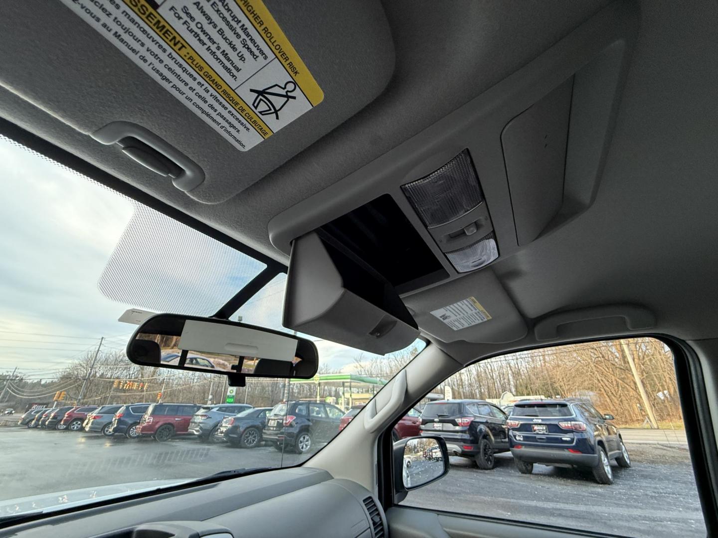 2017 White /Gray Nissan Frontier SV Crew Cab 5AT 4WD (1N6AD0EV5HN) with an 4.0L V6 DOHC 24V engine, Automatic transmission, located at 11115 Chardon Rd. , Chardon, OH, 44024, (440) 214-9705, 41.580246, -81.241943 - 2017 Nissan Frontier SV Crew Cab 4WD – Rugged Capability, Modern Convenience, and Proven Reliability Take on any road or job with confidence in this 2017 Nissan Frontier SV Crew Cab 4WD. Powered by a robust 4.0L V6 engine and a smooth 5-speed automatic transmission, this truck delivers the musc - Photo#25