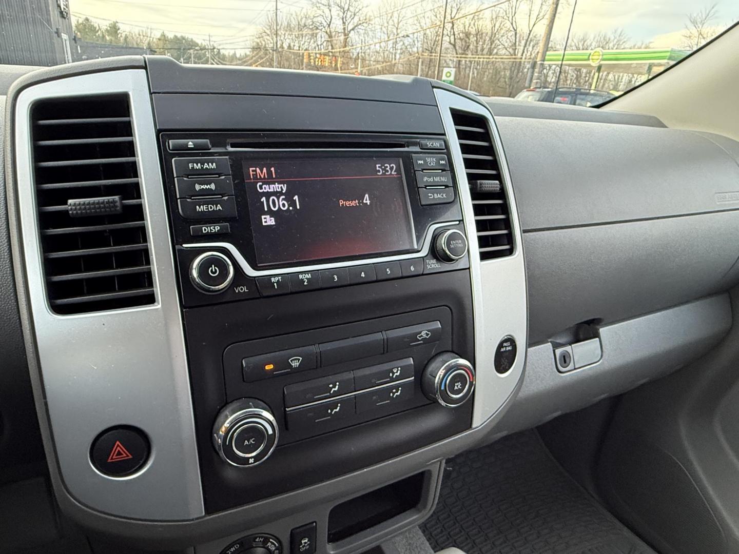 2017 White /Gray Nissan Frontier SV Crew Cab 5AT 4WD (1N6AD0EV5HN) with an 4.0L V6 DOHC 24V engine, Automatic transmission, located at 11115 Chardon Rd. , Chardon, OH, 44024, (440) 214-9705, 41.580246, -81.241943 - 2017 Nissan Frontier SV Crew Cab 4WD – Rugged Capability, Modern Convenience, and Proven Reliability Take on any road or job with confidence in this 2017 Nissan Frontier SV Crew Cab 4WD. Powered by a robust 4.0L V6 engine and a smooth 5-speed automatic transmission, this truck delivers the musc - Photo#9