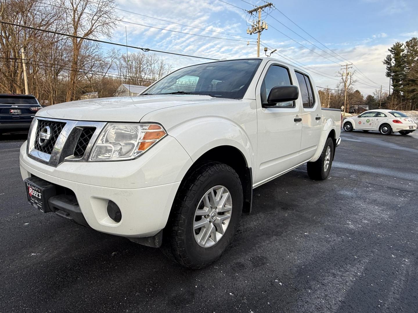 2017 White /Gray Nissan Frontier SV Crew Cab 5AT 4WD (1N6AD0EV5HN) with an 4.0L V6 DOHC 24V engine, Automatic transmission, located at 11115 Chardon Rd. , Chardon, OH, 44024, (440) 214-9705, 41.580246, -81.241943 - 2017 Nissan Frontier SV Crew Cab 4WD – Rugged Capability, Modern Convenience, and Proven Reliability Take on any road or job with confidence in this 2017 Nissan Frontier SV Crew Cab 4WD. Powered by a robust 4.0L V6 engine and a smooth 5-speed automatic transmission, this truck delivers the musc - Photo#20