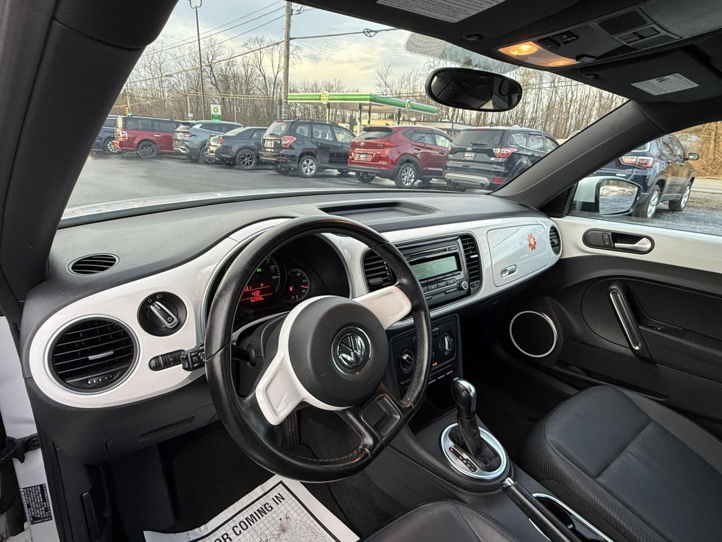 2012 White /Black Volkswagen New Beetle 2.5L (3VWJP7AT9CM) with an 2.5L I5 DOHC 20V engine, Automatic transmission, located at 11115 Chardon Rd. , Chardon, OH, 44024, (440) 214-9705, 41.580246, -81.241943 - 2012 Volkswagen Beetle – Iconic Style, Modern Comfort, and Standout Personality Drive home in classic style with this 2012 Volkswagen Beetle! Powered by a reliable 2.5L I5 engine and a smooth 6-speed automatic transmission, this Beetle blends timeless charm with everyday practicality. The eye-c - Photo#11