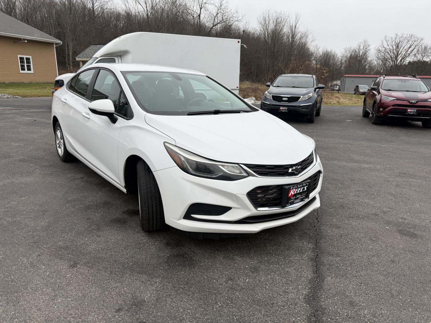 2017 White /Black Chevrolet Cruze LT Auto (1G1BE5SM7H7) with an 1.4L I4 DOHC 16V TURBO engine, Automatic transmission, located at 11115 Chardon Rd. , Chardon, OH, 44024, (440) 214-9705, 41.580246, -81.241943 - 2017 Chevrolet Cruze LT – Exceptional Fuel Economy, Modern Features, and Comfortable Driving Experience efficient and stylish driving with this 2017 Chevrolet Cruze LT. Powered by a spirited 1.4L turbocharged EcoTec engine paired with a smooth 6-speed automatic transmission, this sedan provides - Photo#2