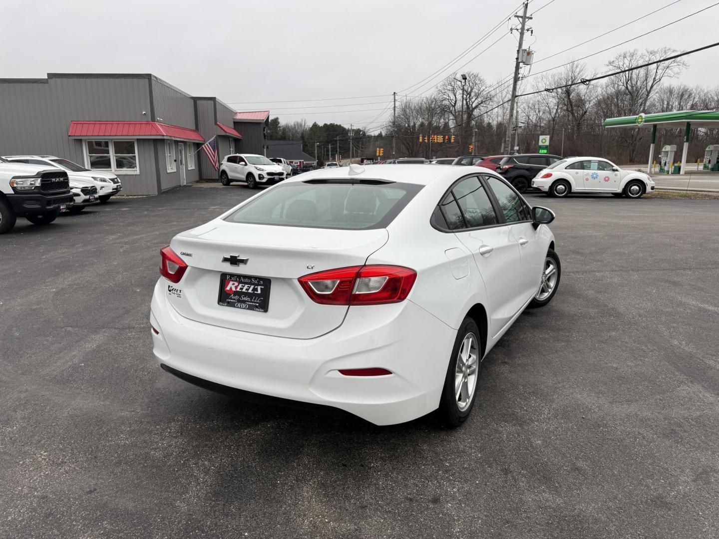 2017 White /Black Chevrolet Cruze LT Auto (1G1BE5SM7H7) with an 1.4L I4 DOHC 16V TURBO engine, Automatic transmission, located at 11115 Chardon Rd. , Chardon, OH, 44024, (440) 214-9705, 41.580246, -81.241943 - 2017 Chevrolet Cruze LT – Exceptional Fuel Economy, Modern Features, and Comfortable Driving Experience efficient and stylish driving with this 2017 Chevrolet Cruze LT. Powered by a spirited 1.4L turbocharged EcoTec engine paired with a smooth 6-speed automatic transmission, this sedan provides - Photo#19