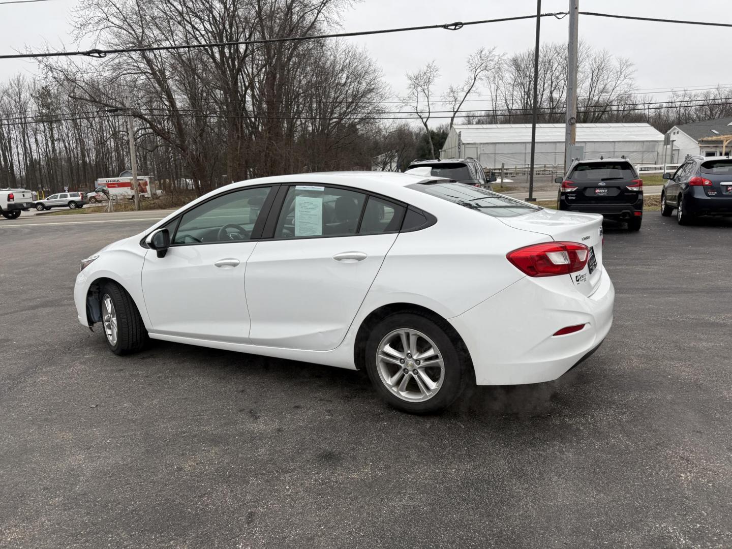 2017 White /Black Chevrolet Cruze LT Auto (1G1BE5SM7H7) with an 1.4L I4 DOHC 16V TURBO engine, Automatic transmission, located at 11115 Chardon Rd. , Chardon, OH, 44024, (440) 214-9705, 41.580246, -81.241943 - 2017 Chevrolet Cruze LT – Exceptional Fuel Economy, Modern Features, and Comfortable Driving Experience efficient and stylish driving with this 2017 Chevrolet Cruze LT. Powered by a spirited 1.4L turbocharged EcoTec engine paired with a smooth 6-speed automatic transmission, this sedan provides - Photo#22